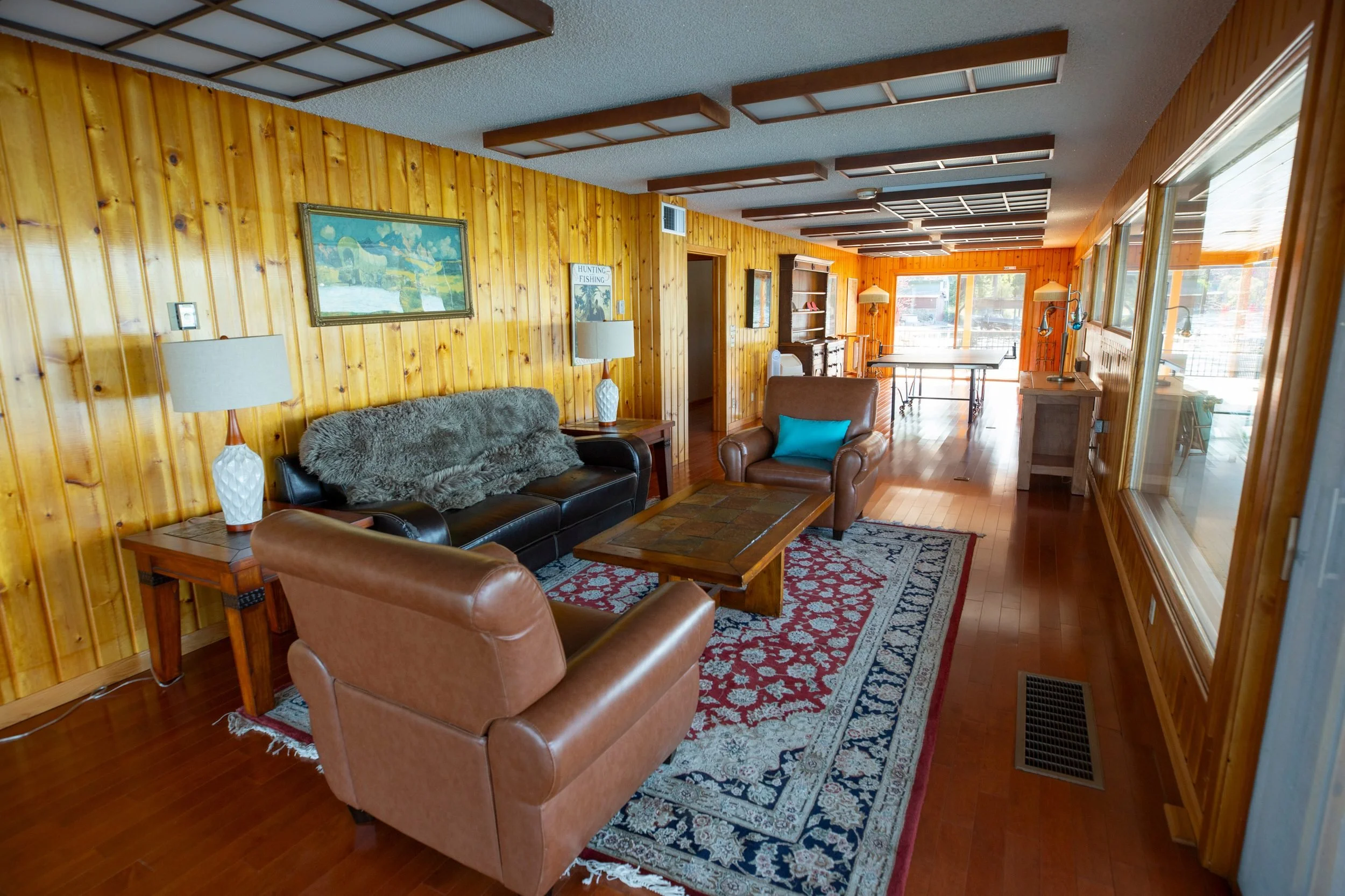 The great room with wood-beamed ceilings at The Retreat on Lake Pend Oreille in Sagle, Idaho