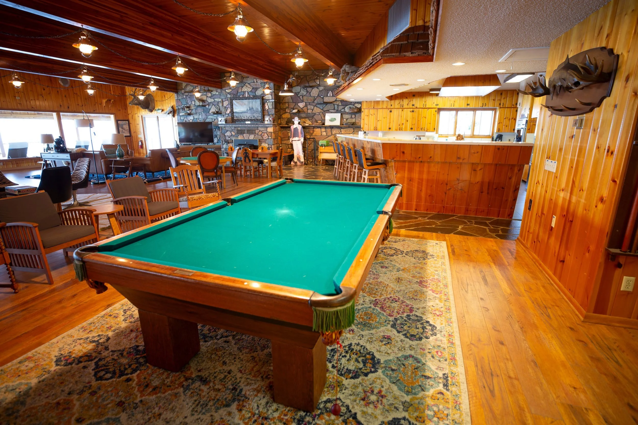 The great room with wood paneling at The Retreat on Lake Pend Oreille in Sagle, Idaho