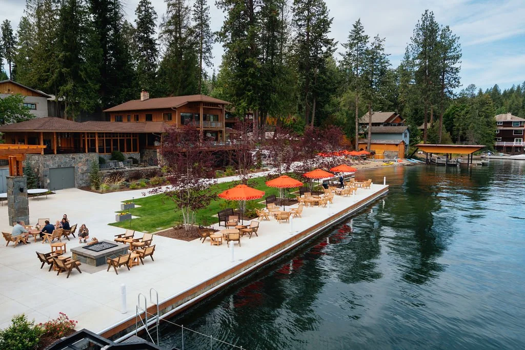 The lakefront patio seen from the water at The Retreat on Lake Pend Oreille in Sagle, Idaho
