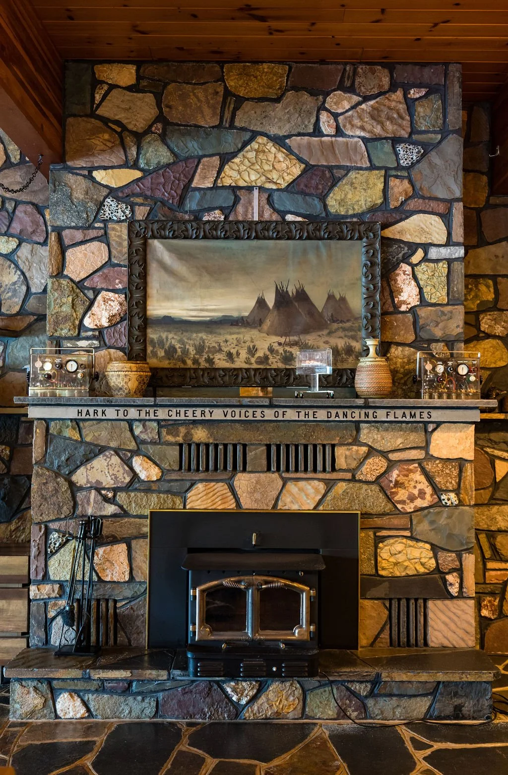 The stone fireplace in the lounge at The Retreat on Lake Pend Oreille in Sagle, Idaho