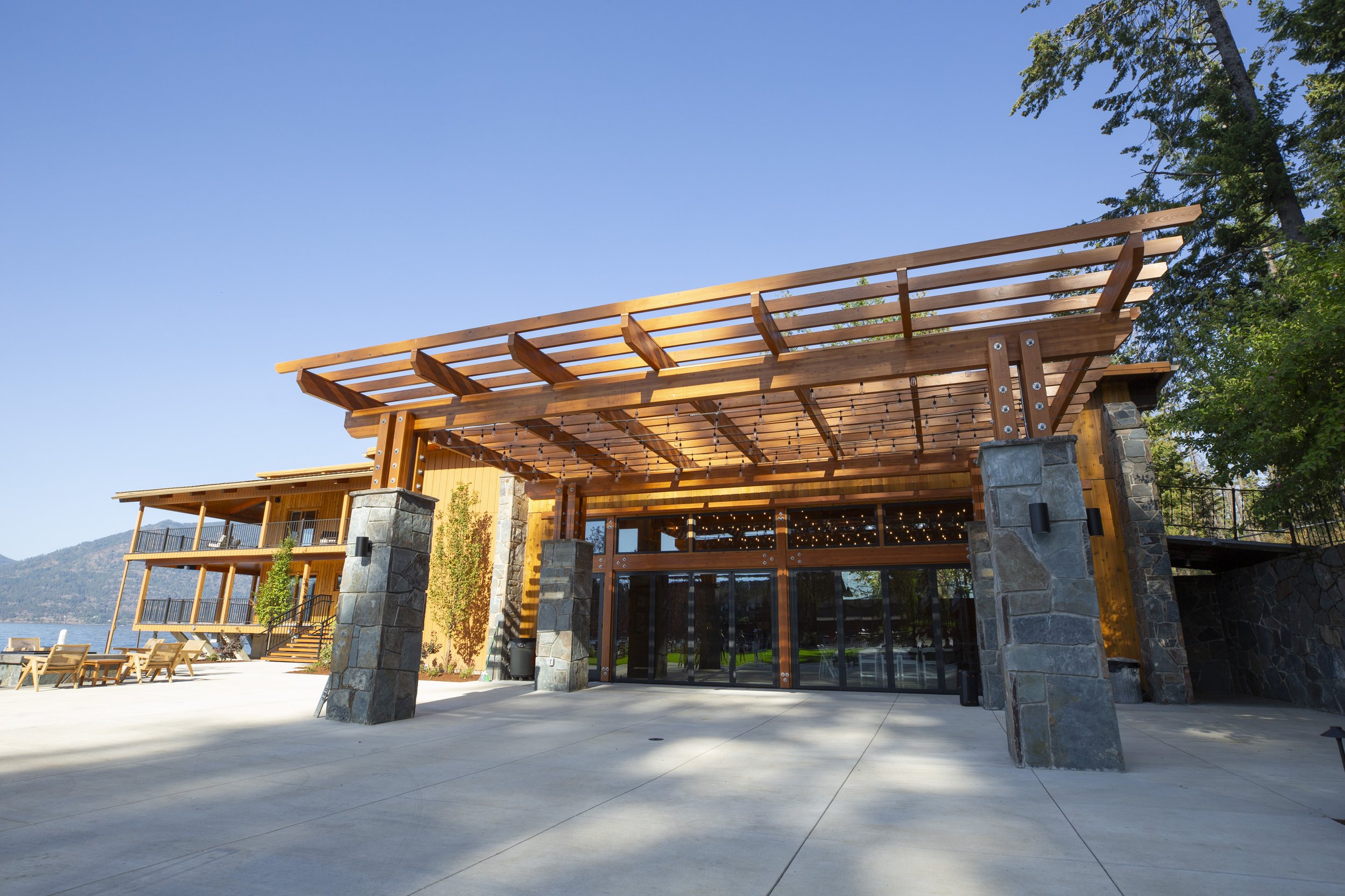 The covered pavilion and stone columns at The Retreat on Lake Pend Oreille