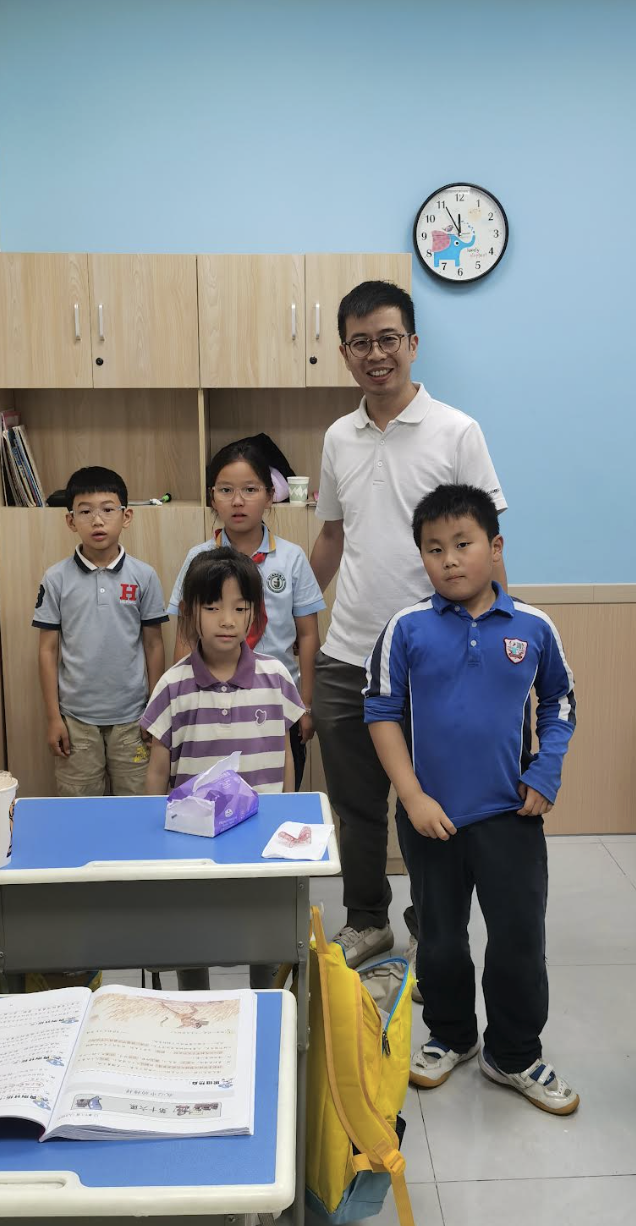 Chinese guy with kids in shelter