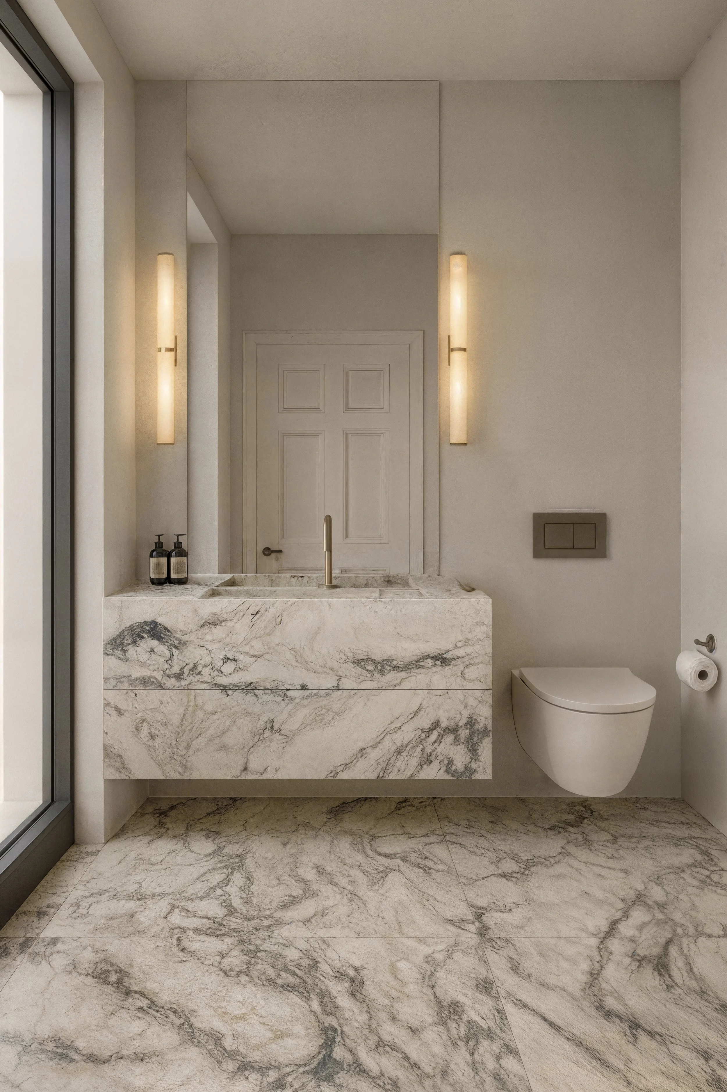 Modern bathroom with white marble sink, wall-mounted toilet, and beige walls with vertical wall lights.
