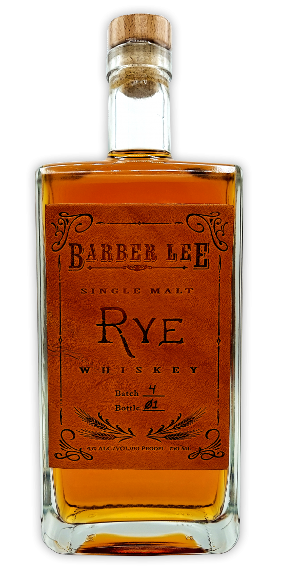 A clear glass bottle of rye whiskey with an orange label and wooden cap, labeled 'Barber Lee Single Malt Rye Whiskey, Batch 4, Bottle 01, 45% alcohol.'