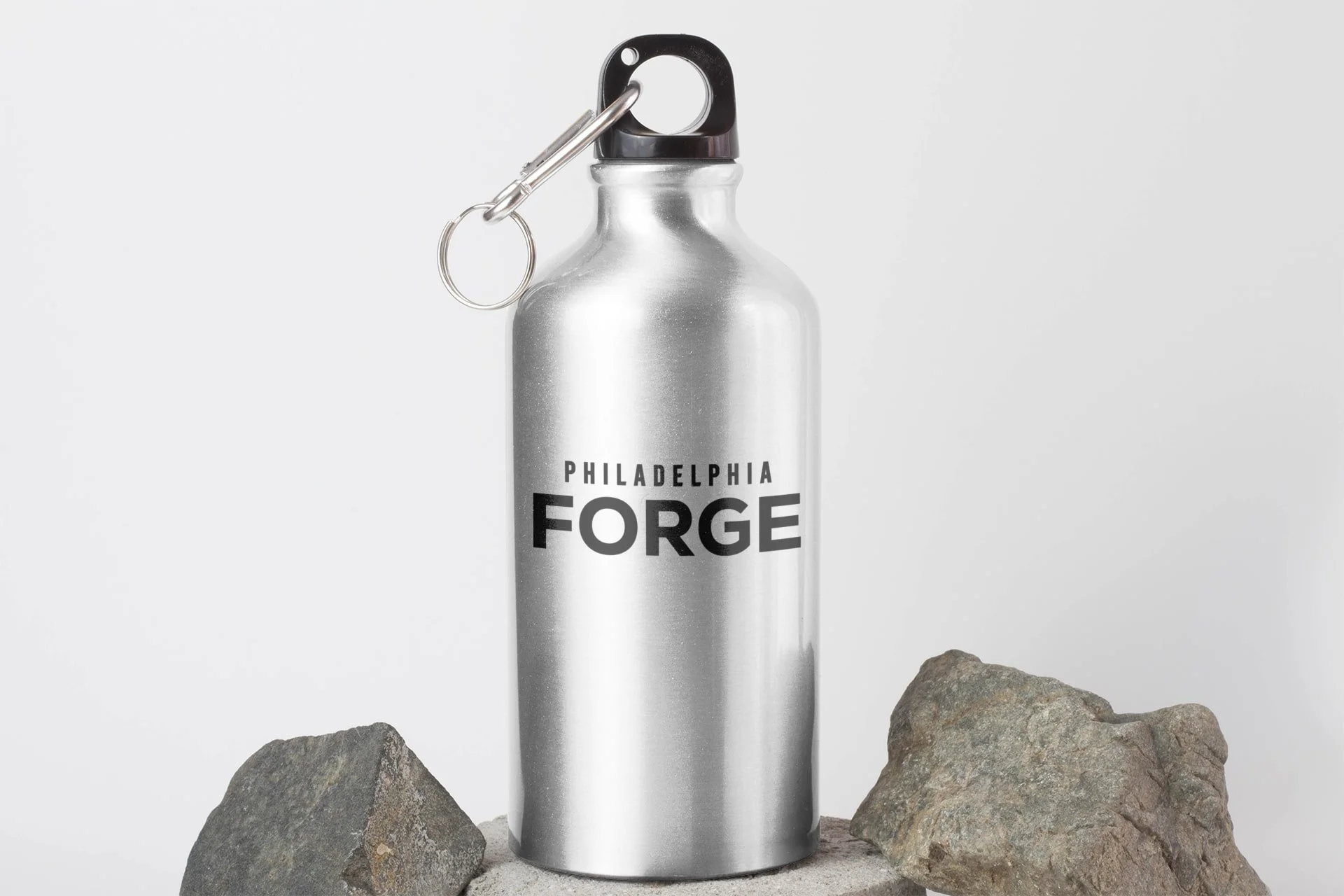 aluminum-bottle-mockup-featuring-some-rocks-3087-el1-min.jpg