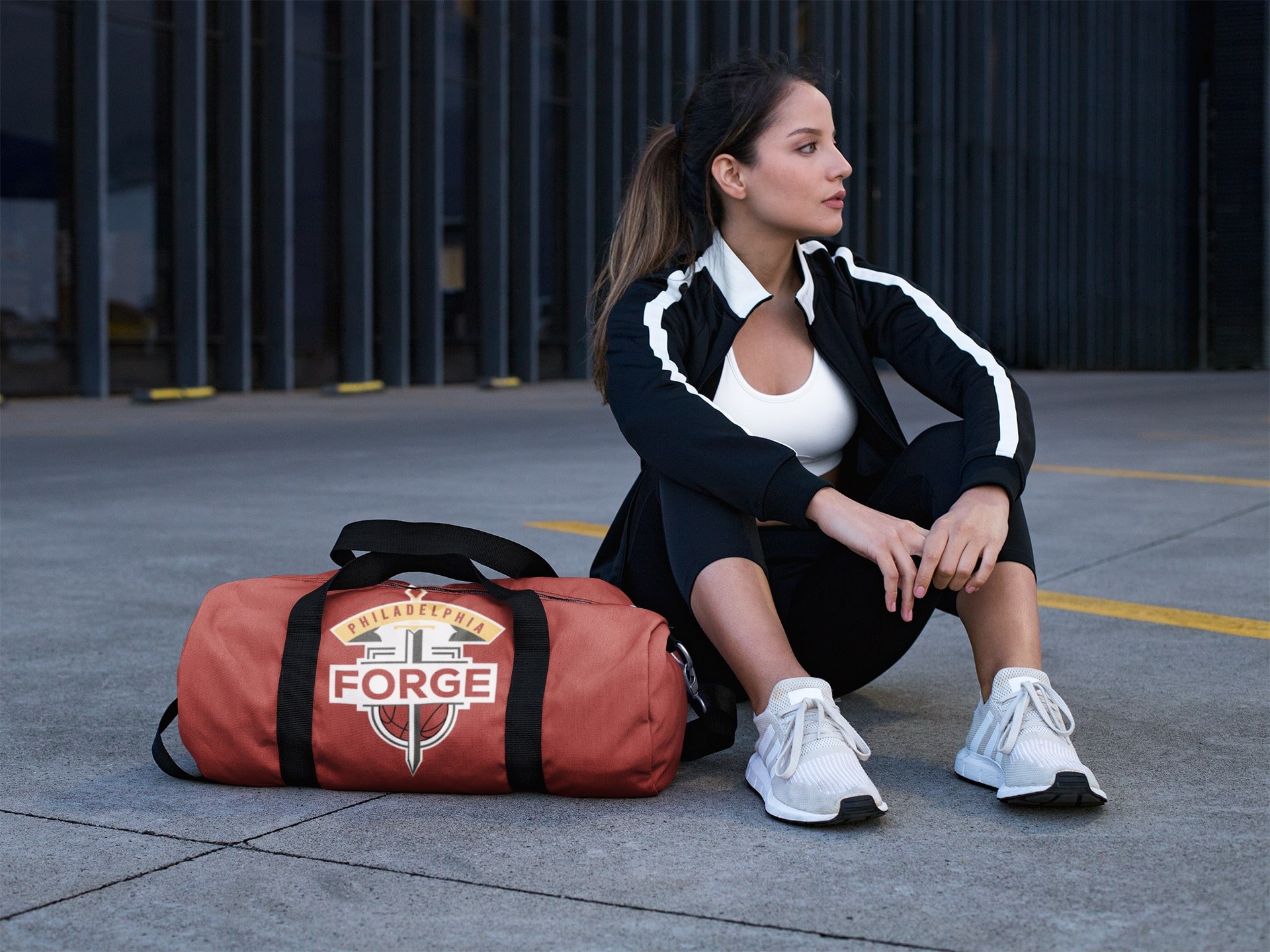 mockup-of-a-woman-sitting-next-to-a-duffle-bag-23050-min.jpg