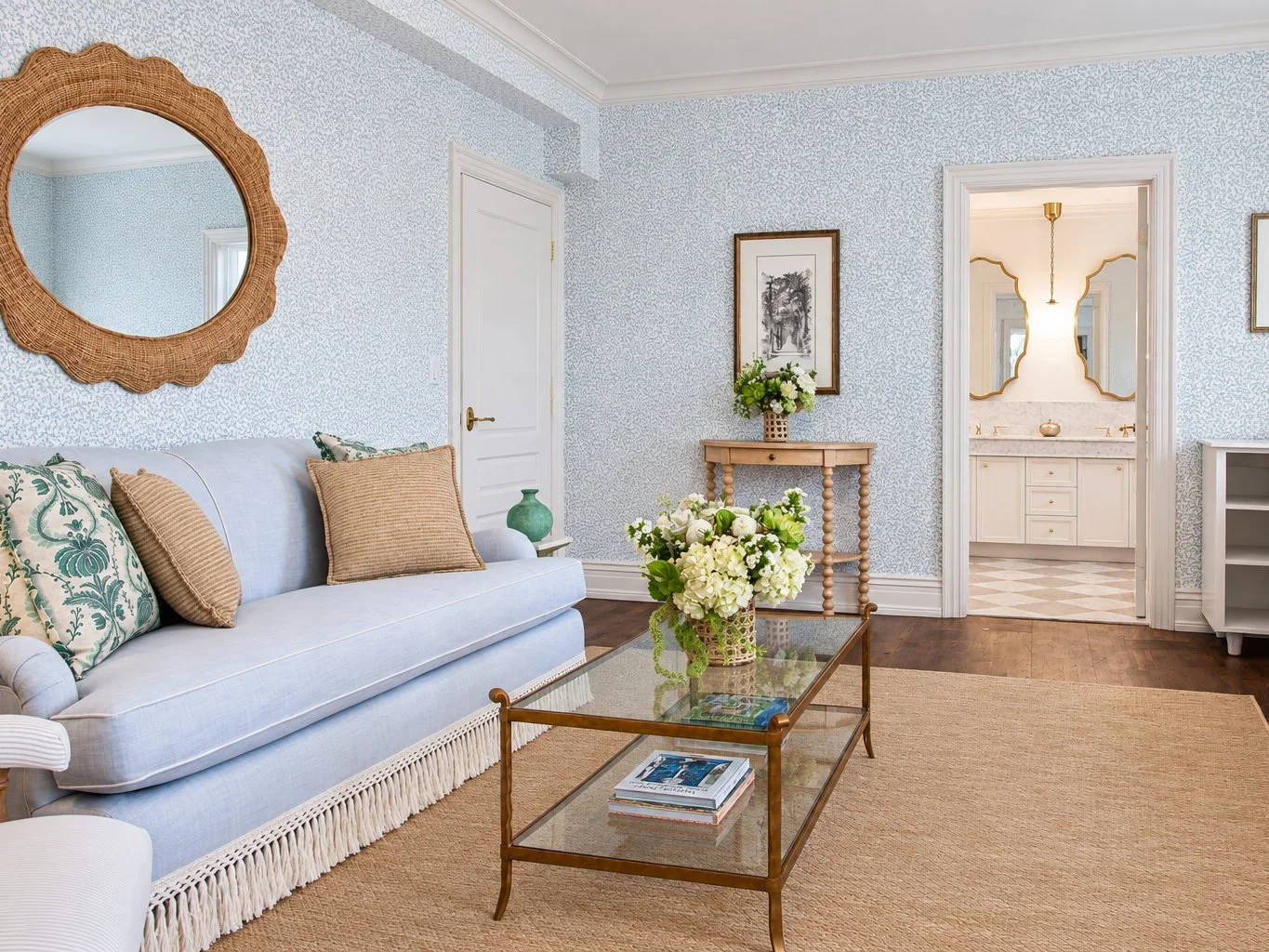 Two chairs and a small table in the window nook of a suite