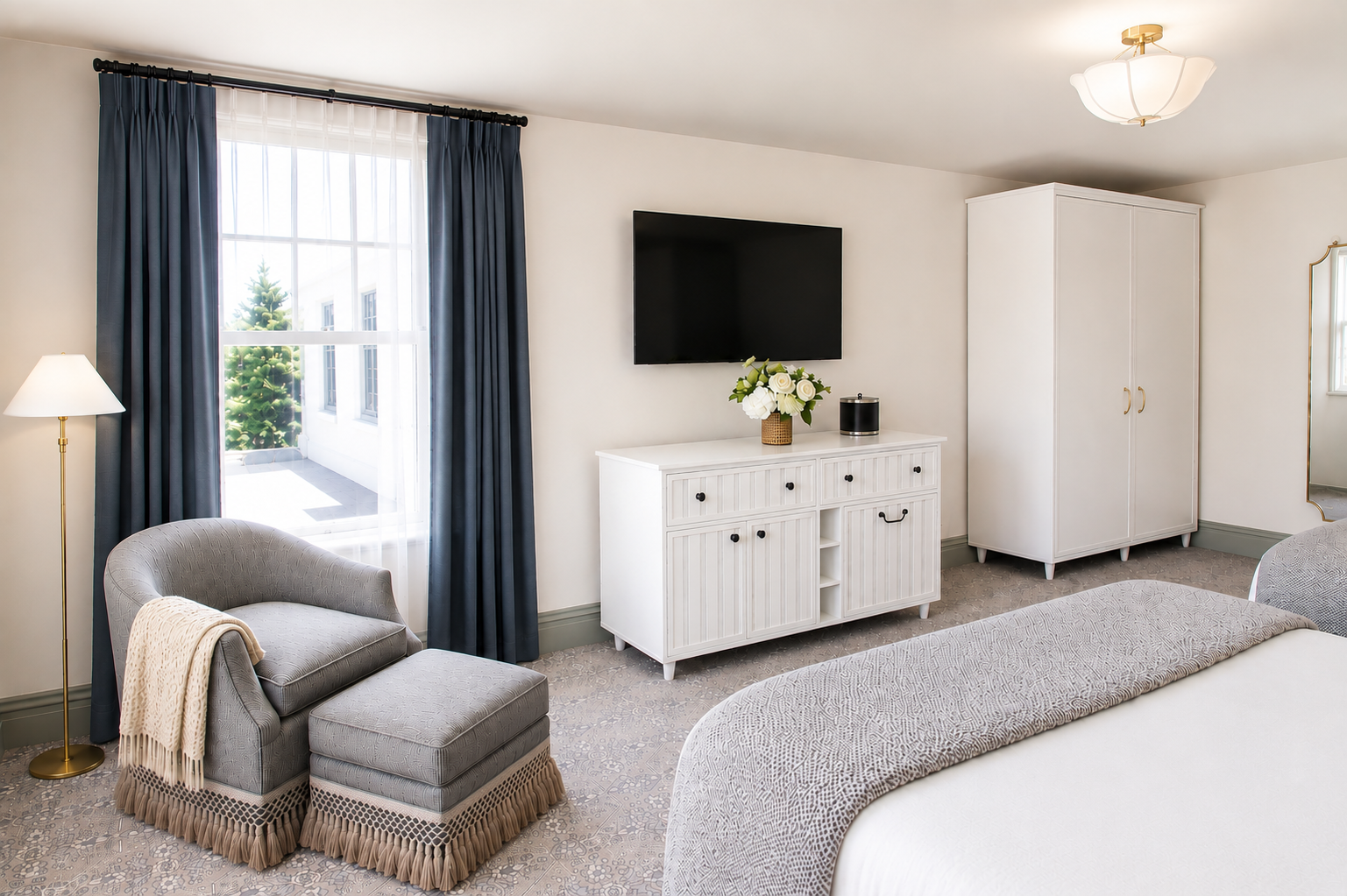 A corner guest room on the second floor, windows on two walls