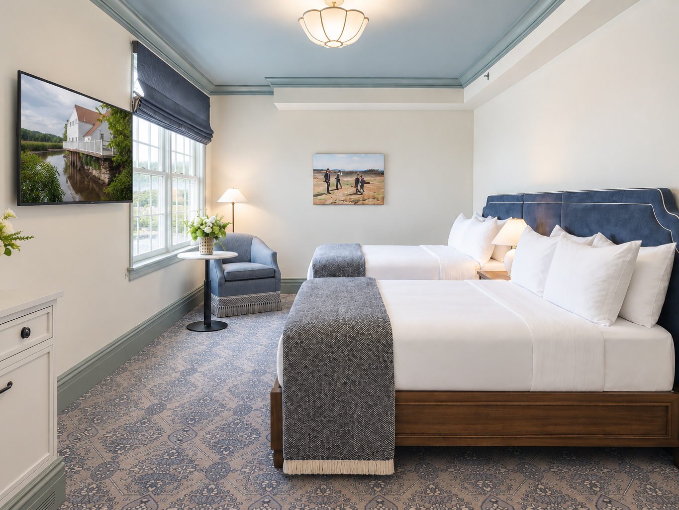 A corner guest room on the second floor, windows on two walls