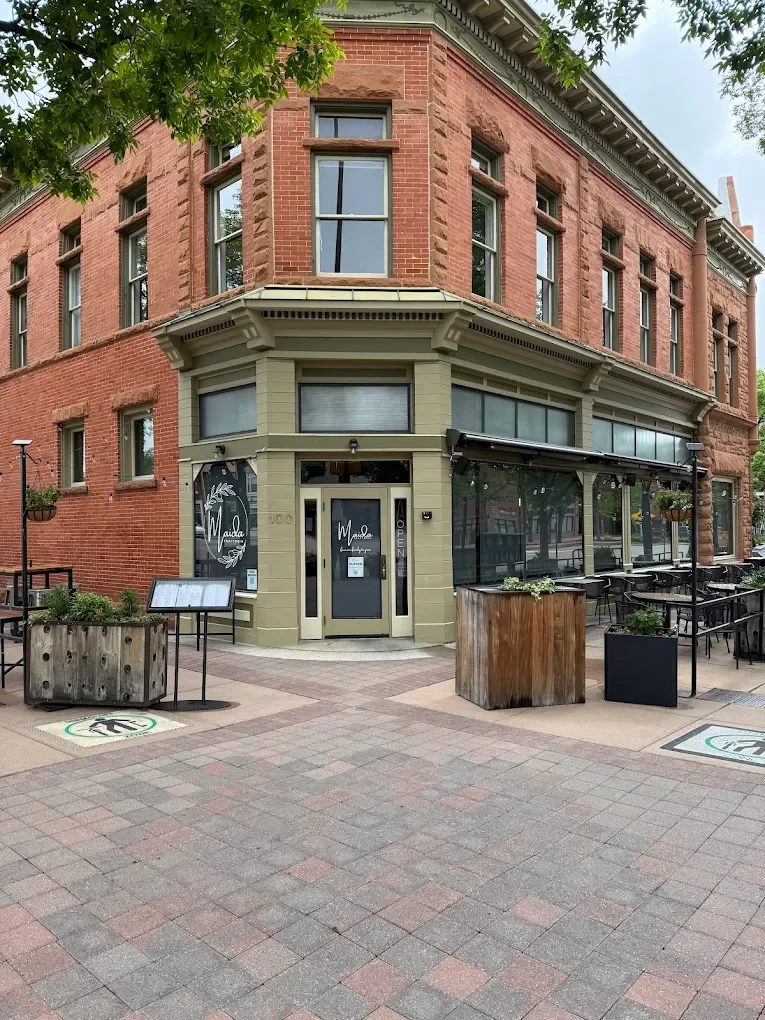 Outdoor patio seating at a downtown Fort Collins restaurant