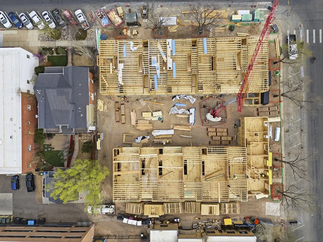 Structural framing underway on the corner of Oak and Mathews