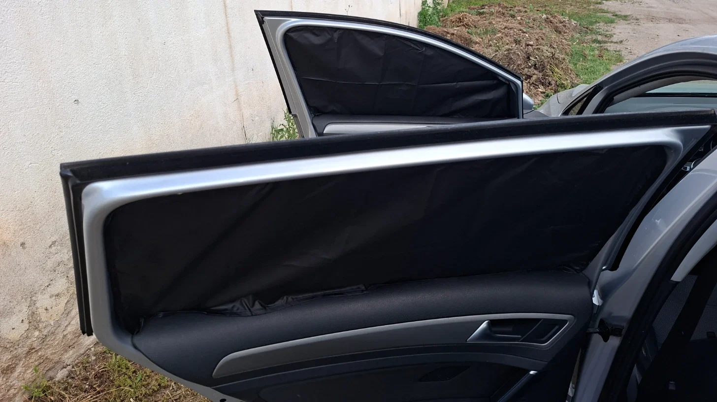 Privacy window covers fitted inside the side windows of a VW Golf Estate.