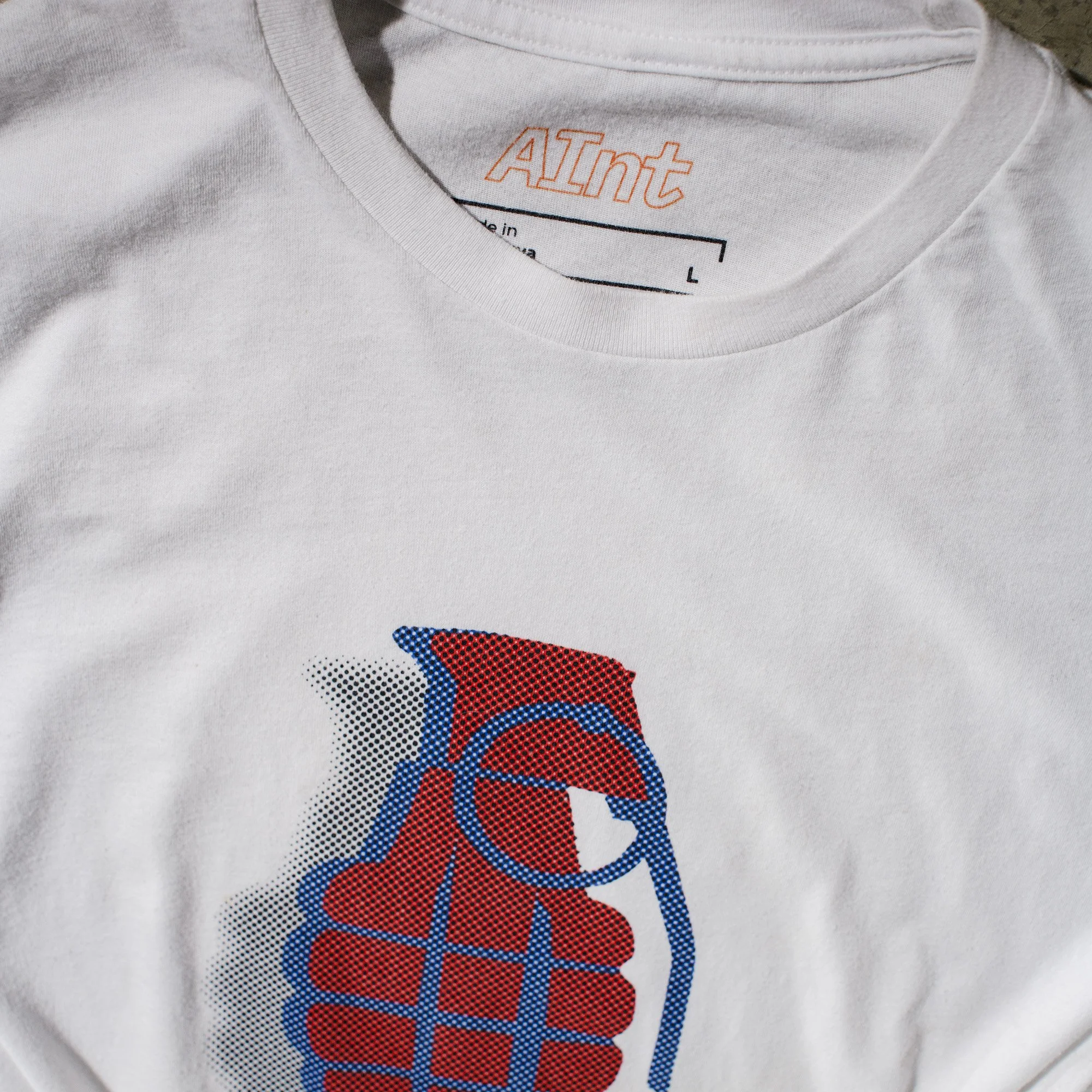 AInt-white-next-level-6210-grenade-t-shirt-halftone-red-blue-dot-with black-drop-shadow-detail.jpg
