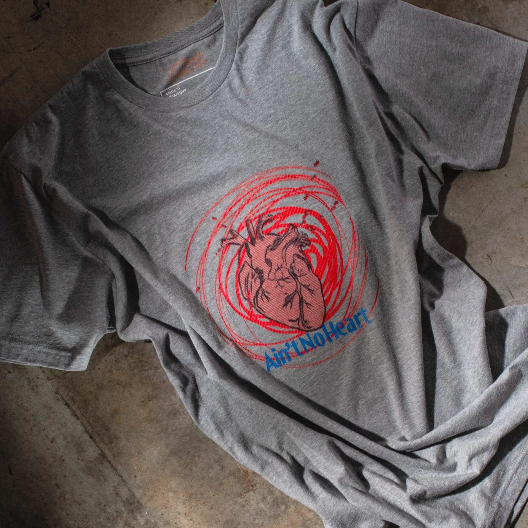 AInt-no-heart-t-shirt-studio-concrete-floor-product-photography-graphic-next-level-6210.jpg