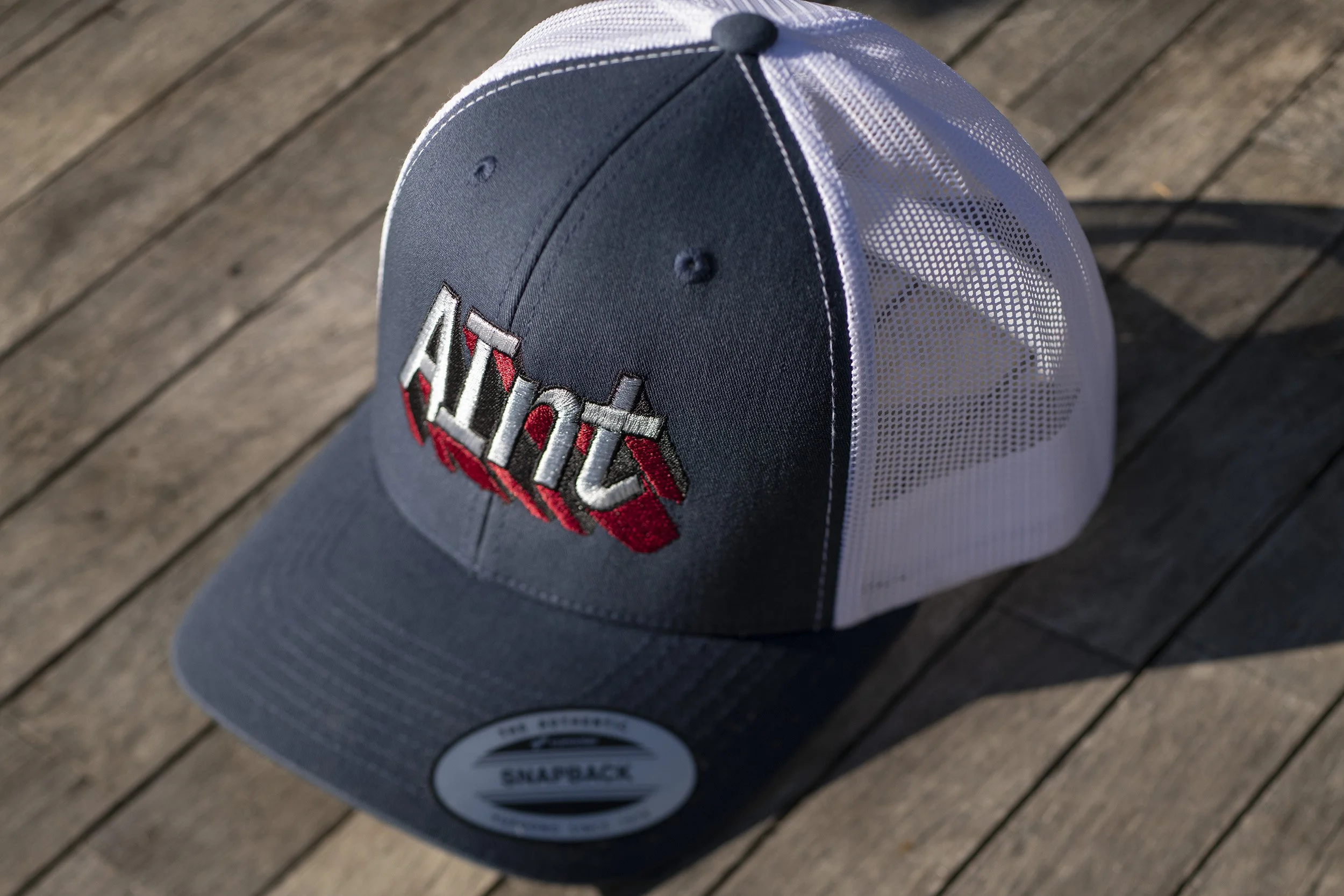 aint-retro-trucker-angled-view-embroidered-aint-logo.jpg