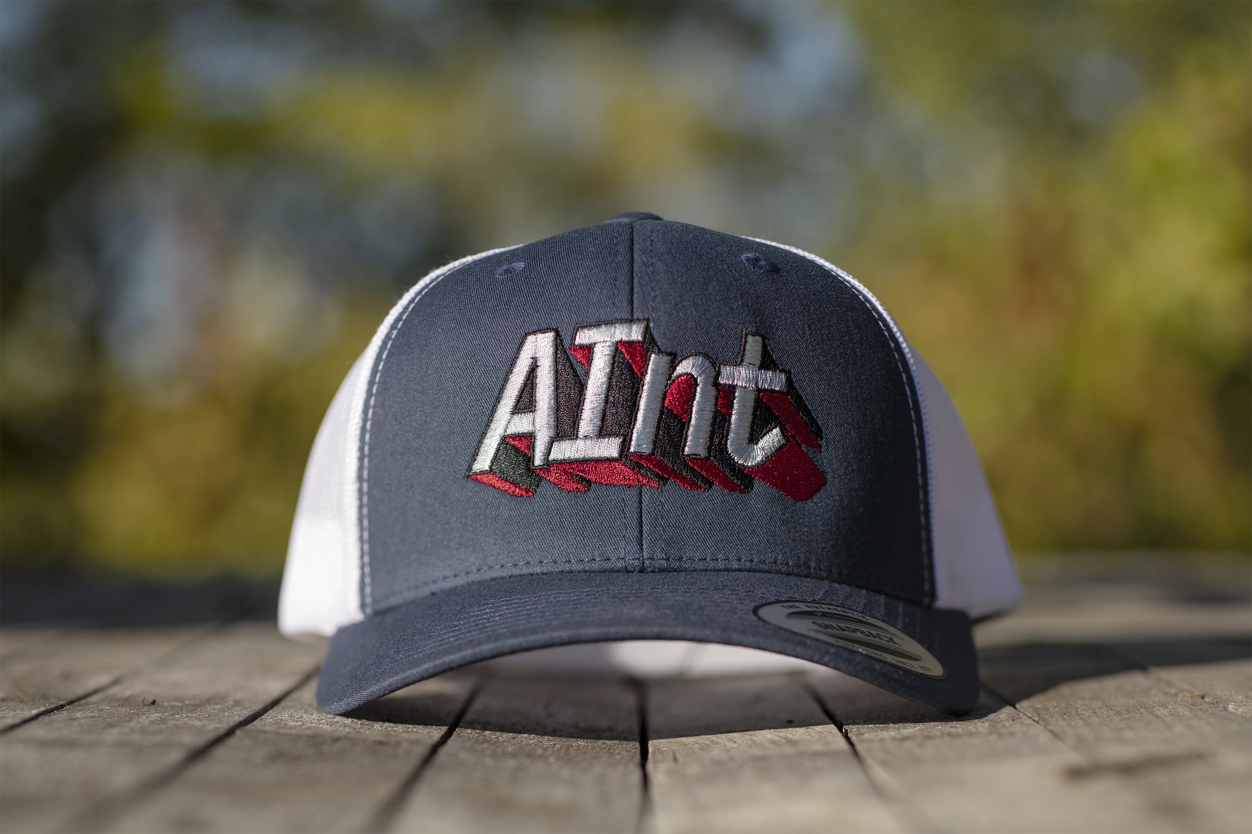 aint-retro-trucker-cap-snapback-yupoong-6606-front-embroider.jpg
