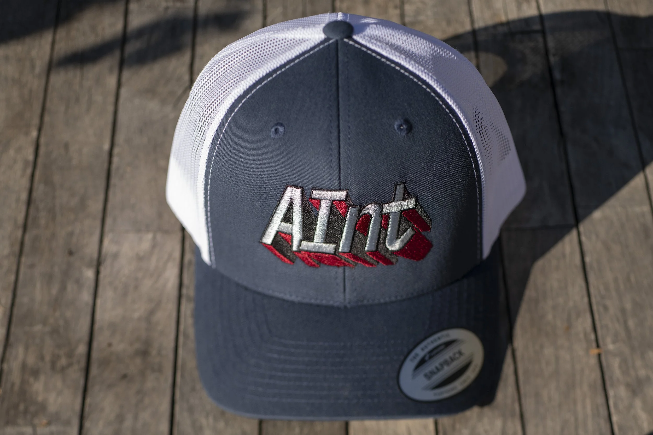aint-retro-trucker-cap-yupoong-6606-front-embroider.jpg