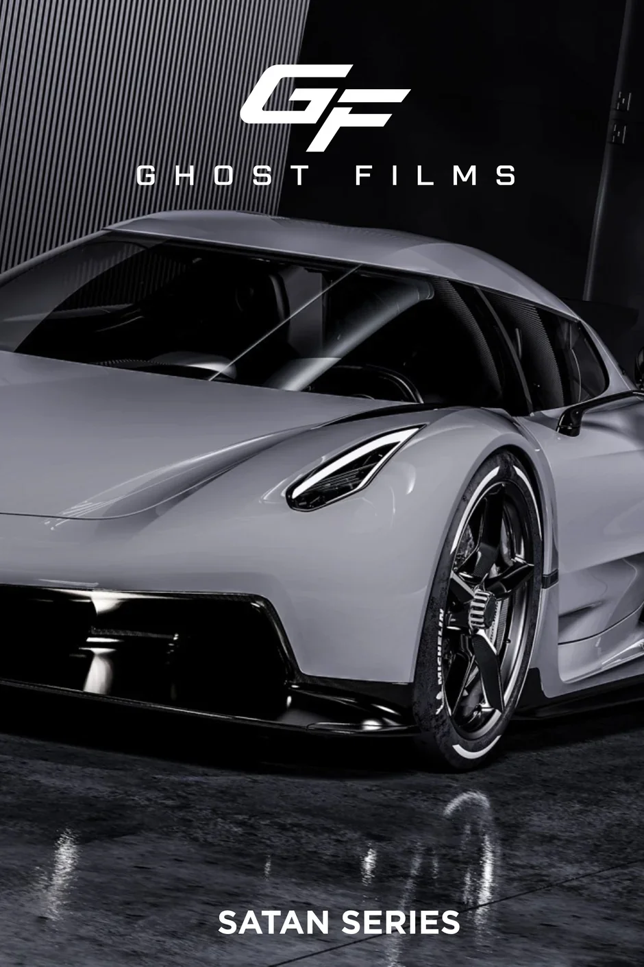 A silver sports car with black wheels parked indoors next to a dark wall, with the logo and text 'Ghost Films' and 'Satan Series' displayed above and below the car.