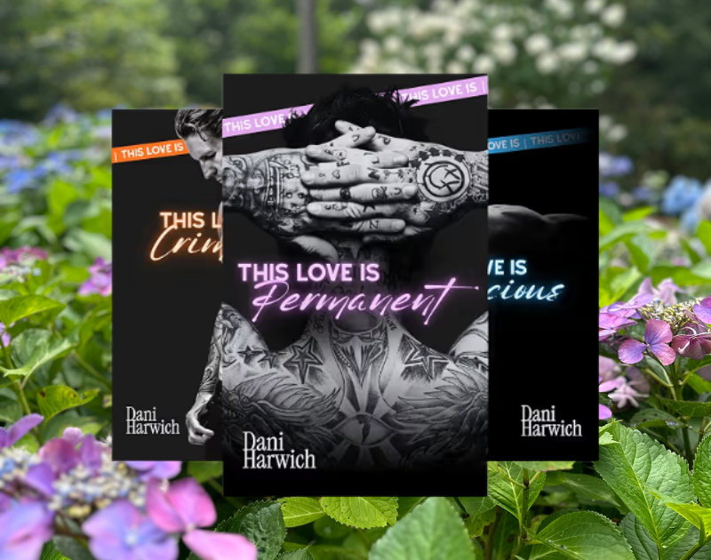 Book covers displayed in front of a garden scene with blooming flowers and green foliage. The middle cover shows a black and white tattooed person with their hands covering their face, titled "This Love is Permanent" by Dani Harwich. The other covers are partially visible behind, with different titles and colors.