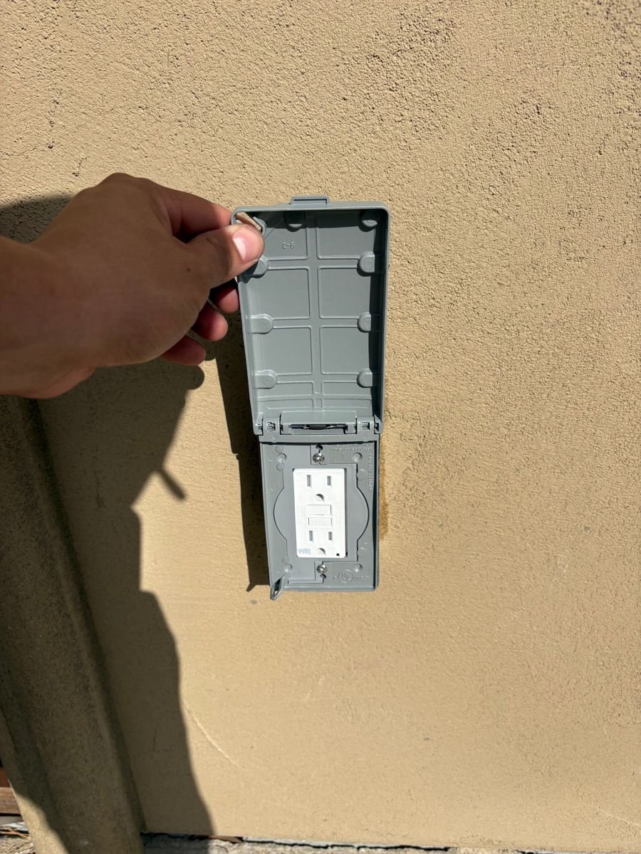 Weatherproof outdoor GFCI outlet installation