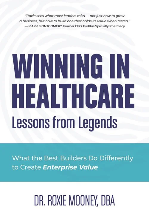 Cover of the book titled 'Winning in Healthcare: Lessons from Legends' by Dr. Roxie Mooney, DBA, featuring a quote from Mark Montgomery at the top.
