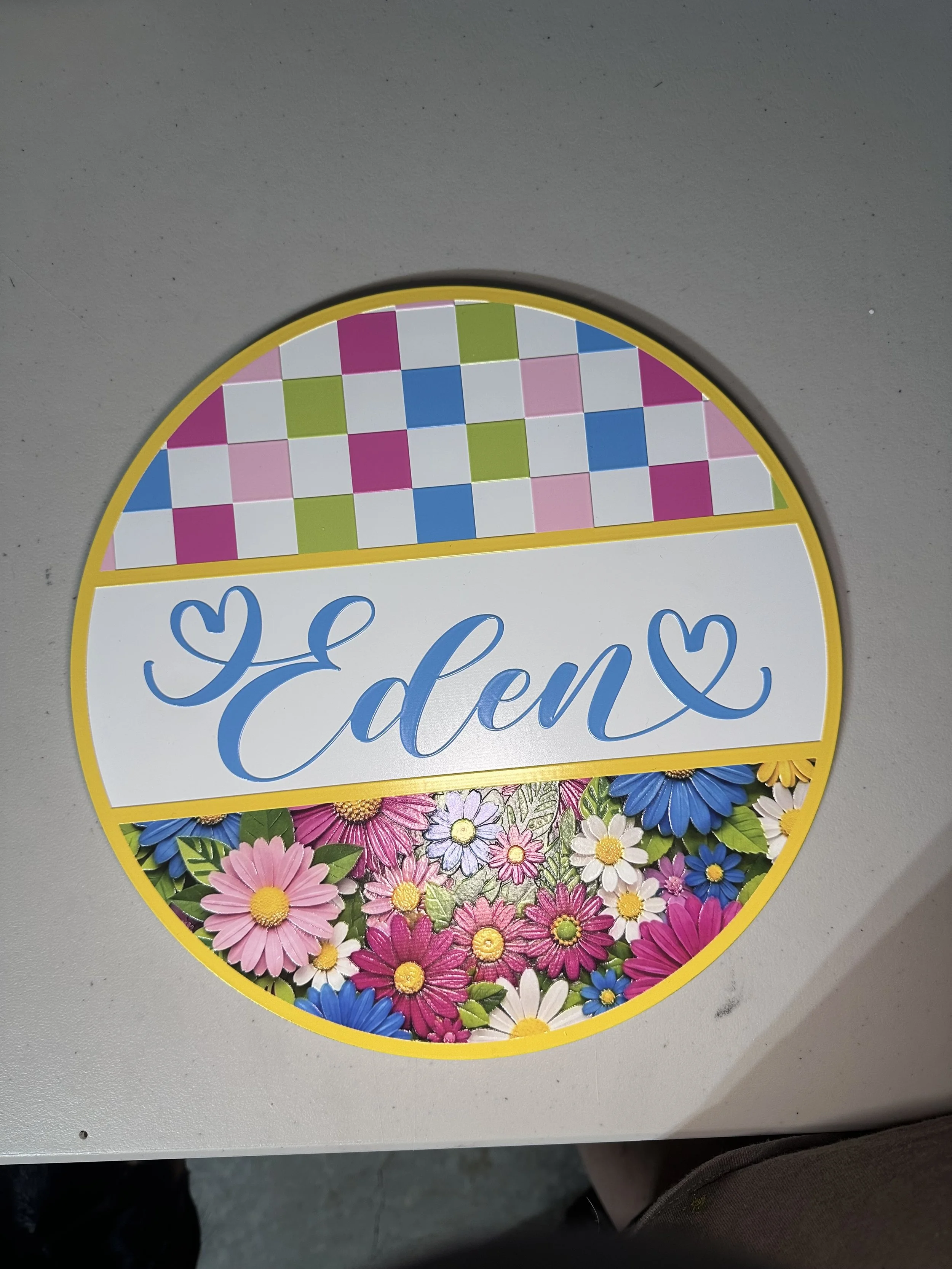 uv printed sign. uv printed textured sign. round sign. sign for girls room.