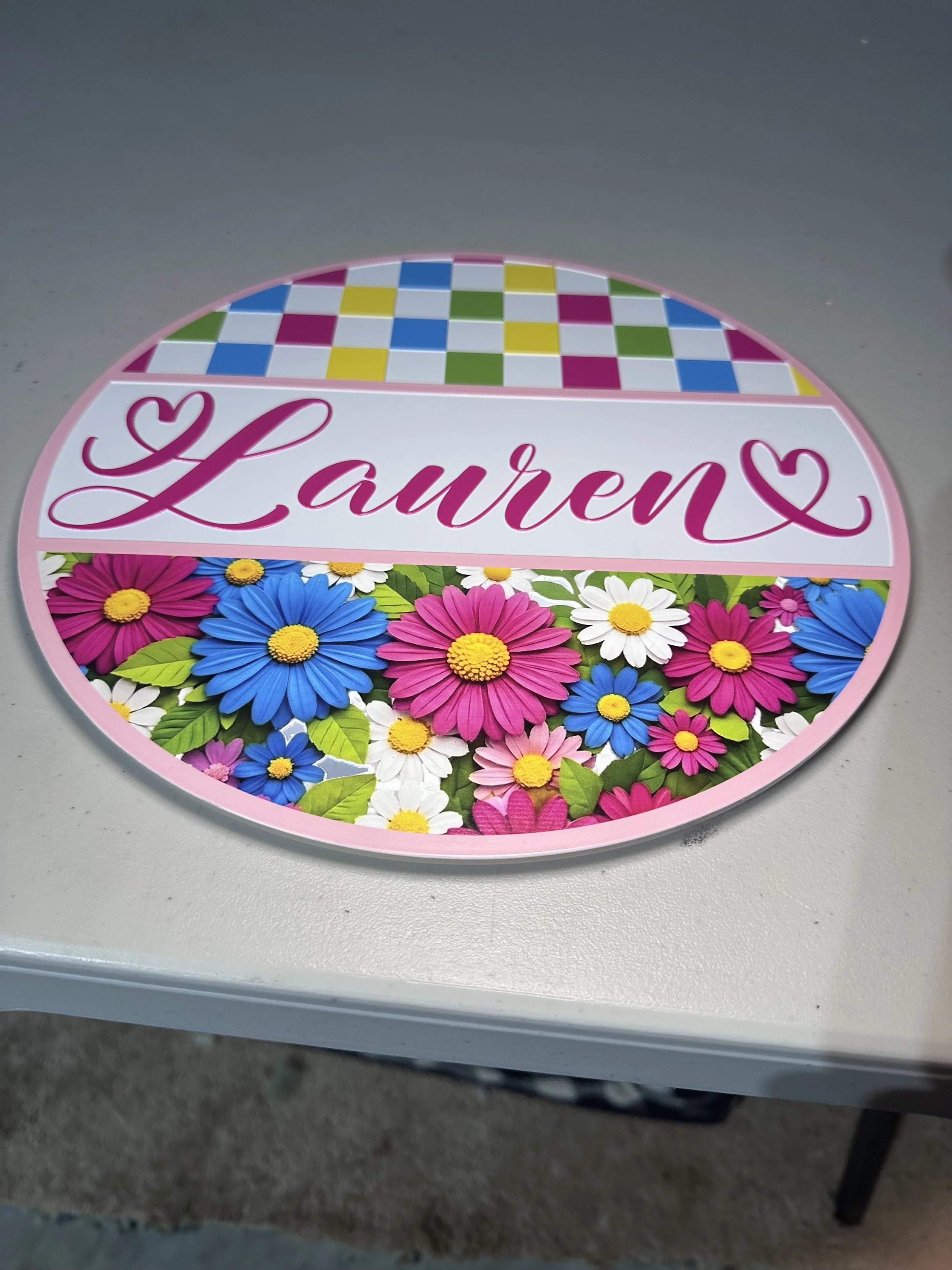 uv printed sign. uv printed textured sign. round sign. sign for girls room.