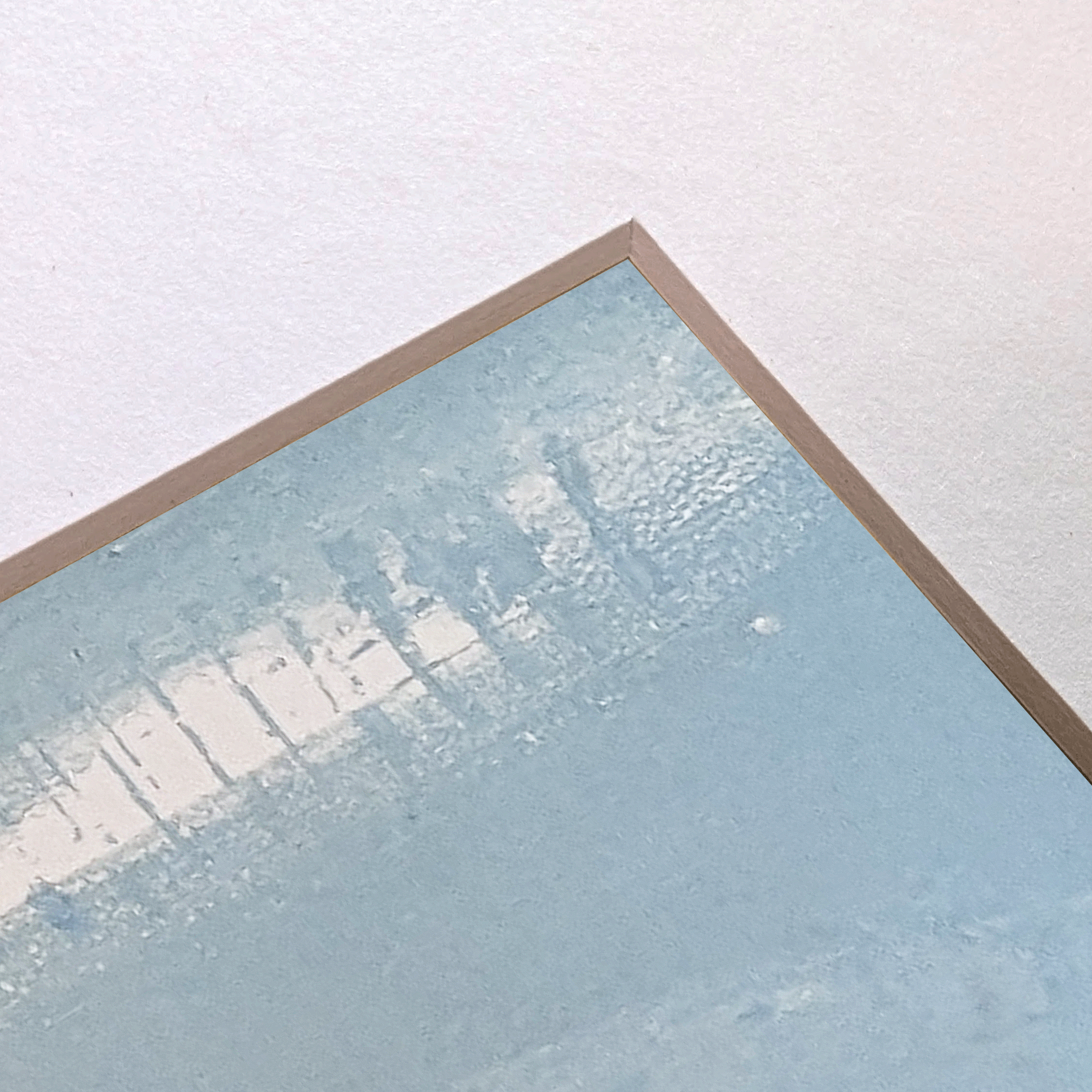 Angled view of Trace No. 05 showing paper texture, mat edge, and subtle blue acrylic surface