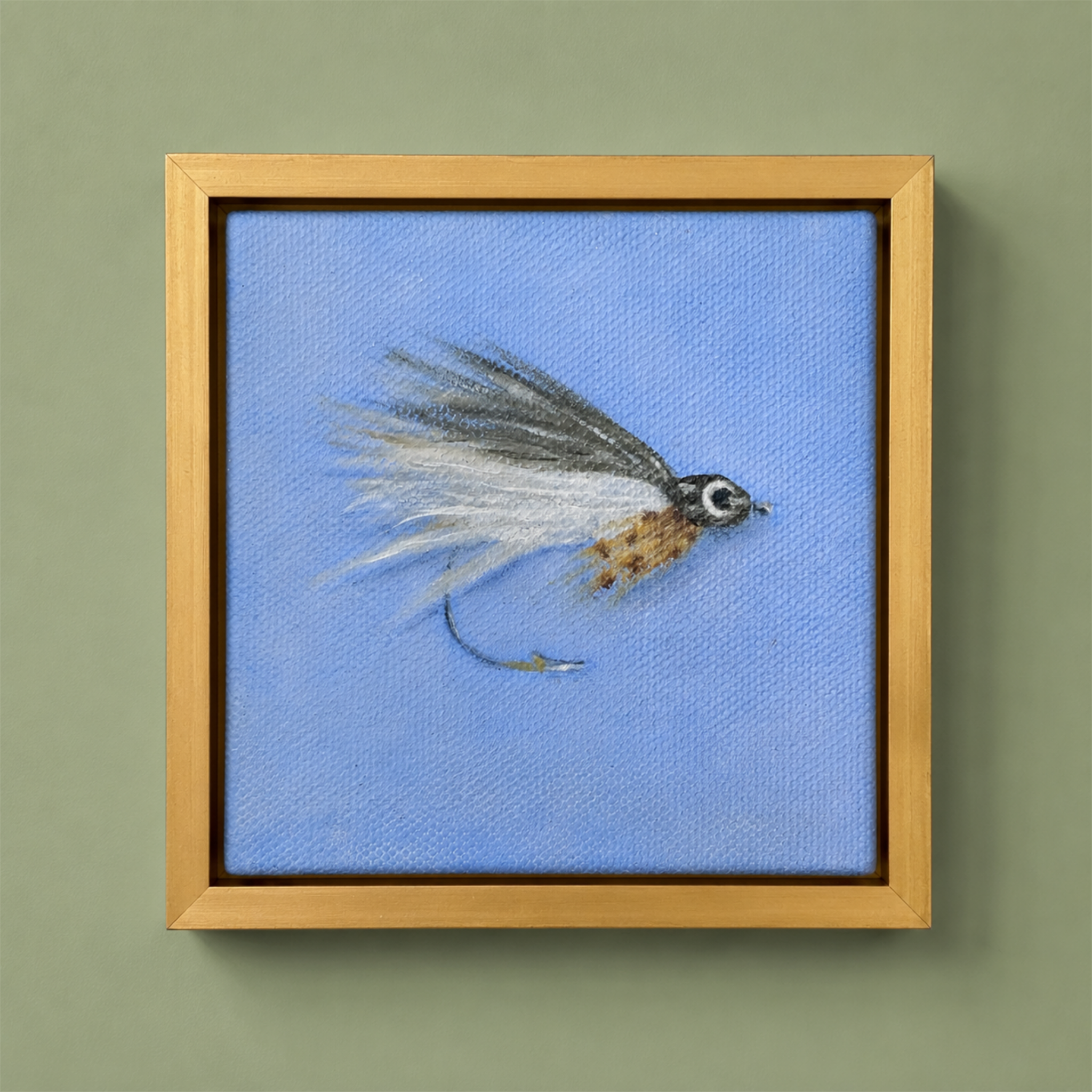 Small square ghost fly fishing lure oil painting shown on canvas board, ready to frame or display as part of a collected wall.