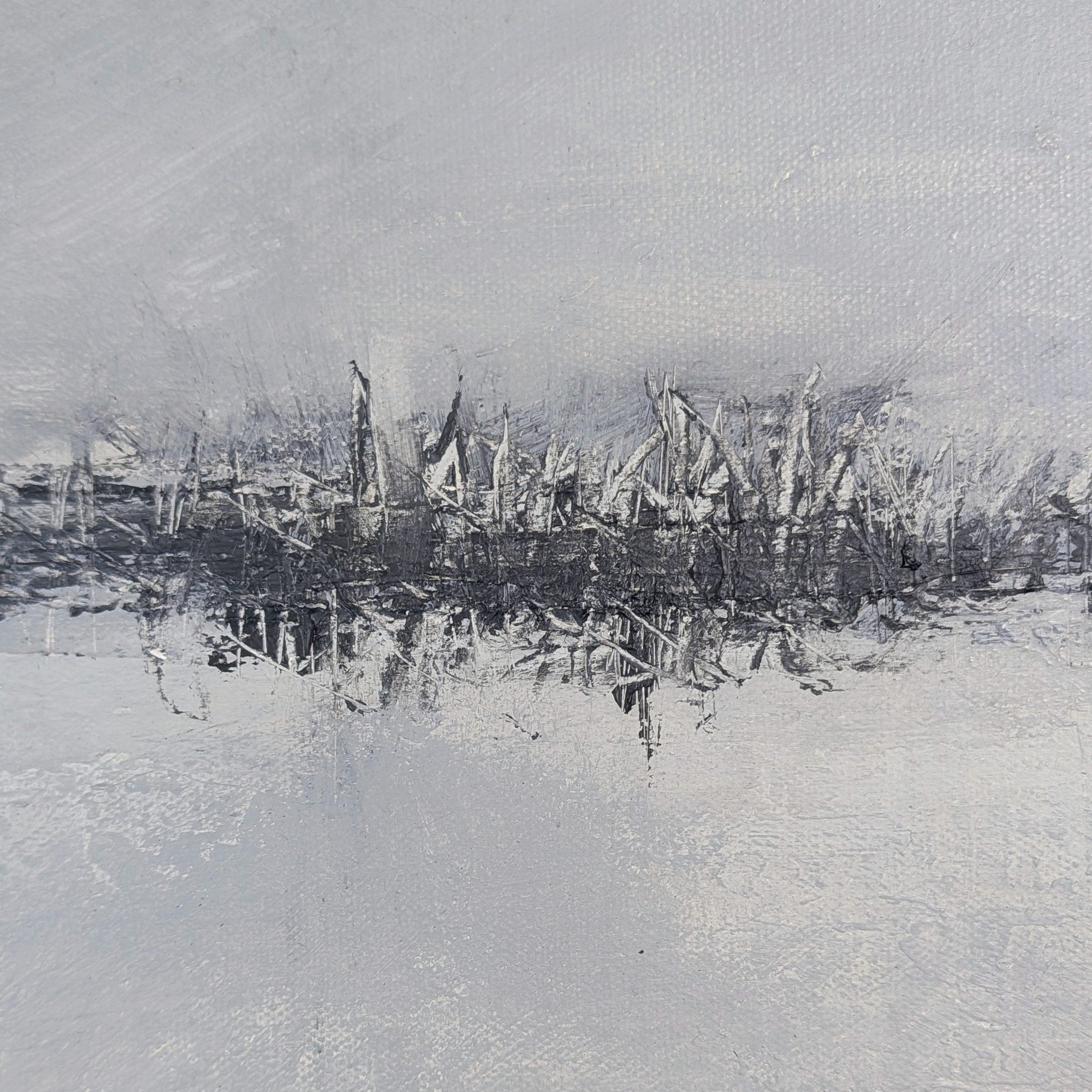 Close-up of textured acrylic paint with gray-blue, warm white, charcoal, and pale neutral surface marks.