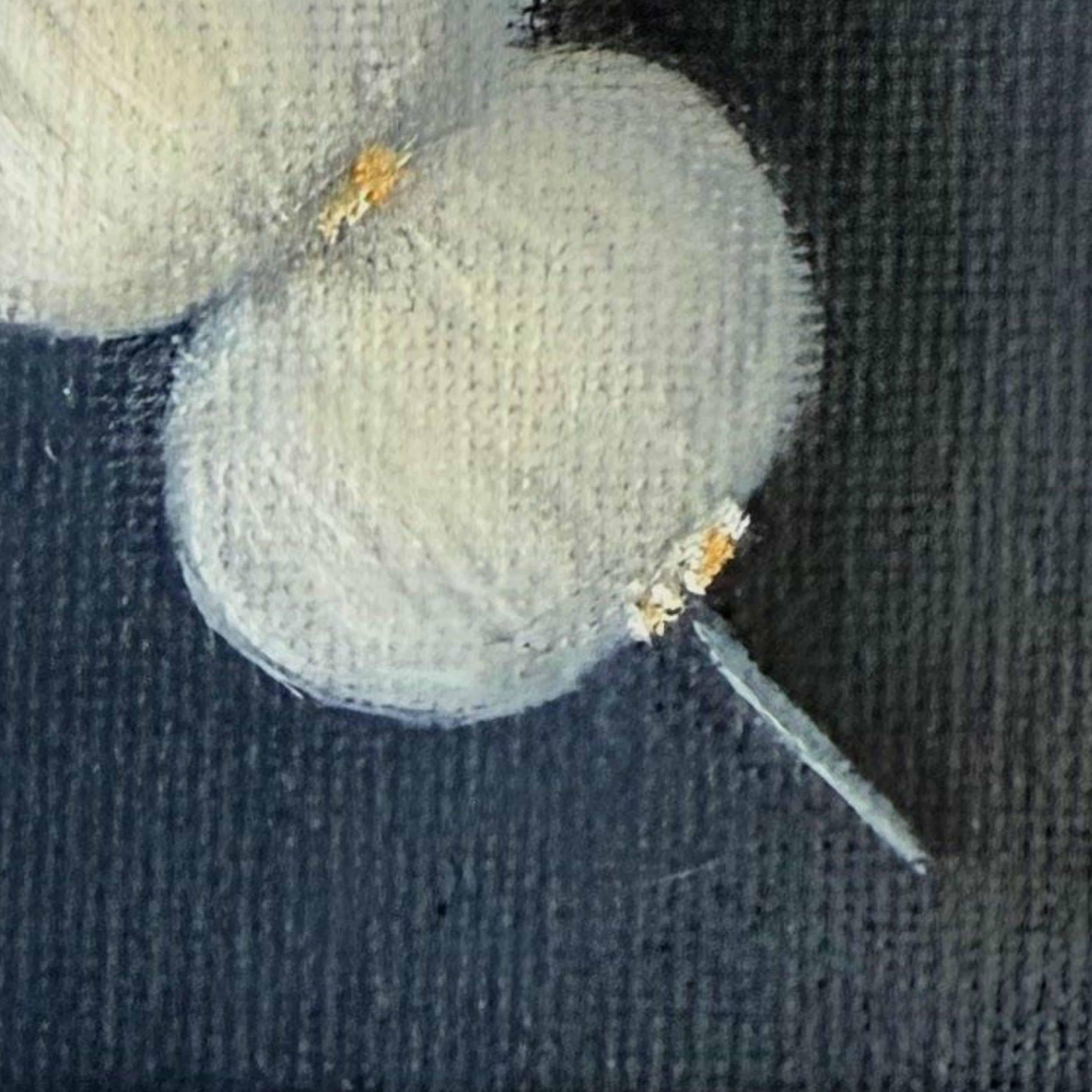 Close-up of a miniature cocktail garnish painting with soft white rounded forms, subtle shadows, small warm accents, and visible canvas texture.