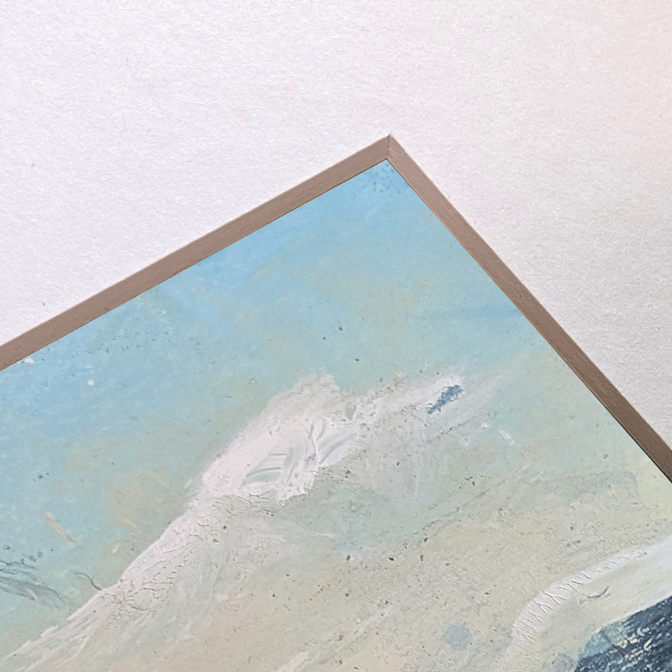Angled view of Trace No. 02 showing paper texture, mat edge, and layered abstract landscape surface