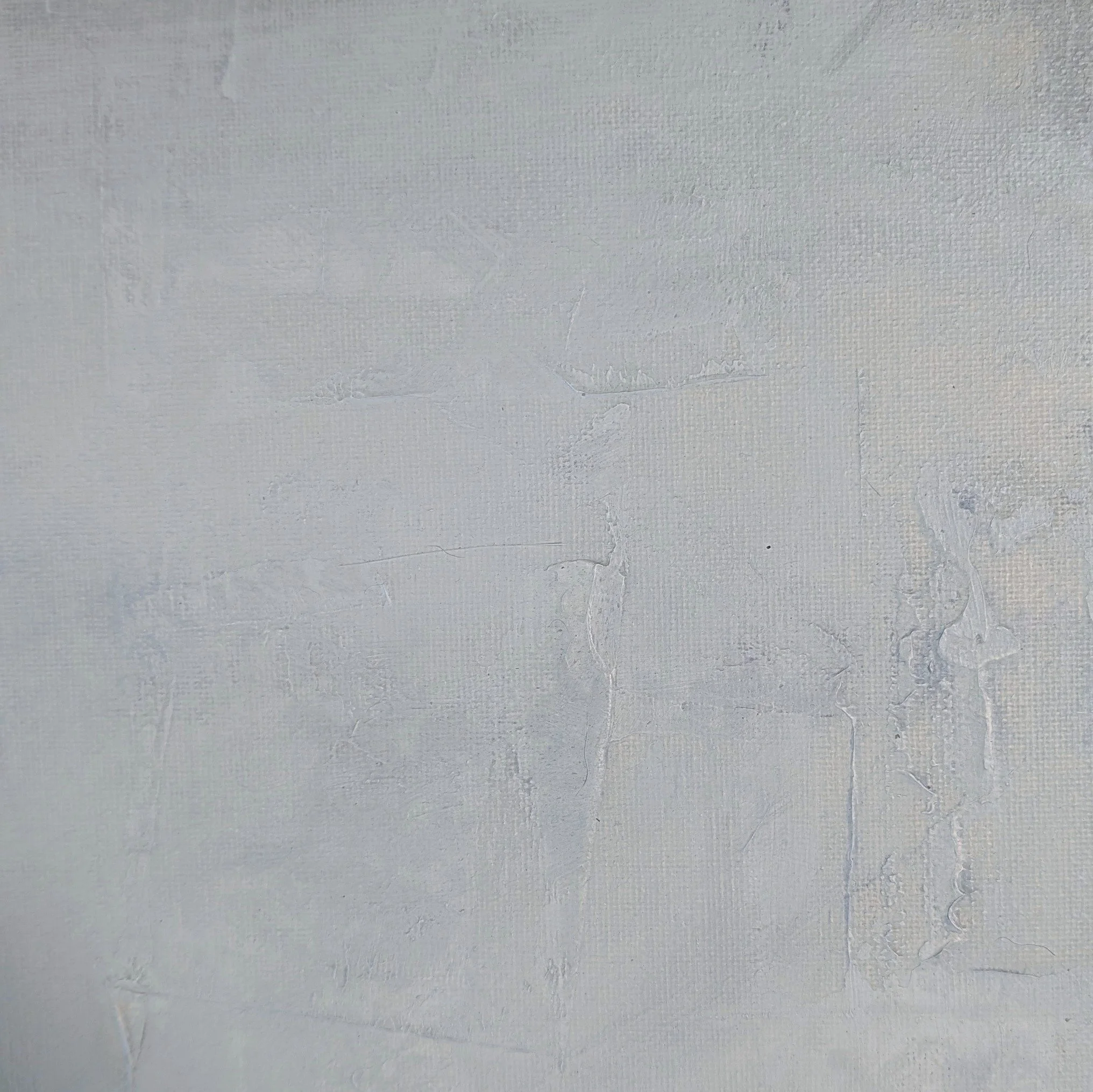 Close-up of textured acrylic paint with soft gray-blue, warm white, and pale neutral surface marks.