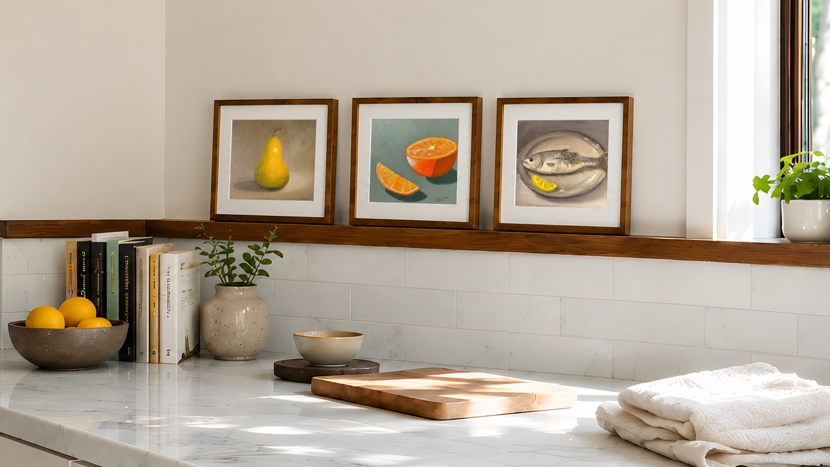 Small framed still life paintings on a kitchen shelf, showing how original art can work in smaller spaces and collected interiors.