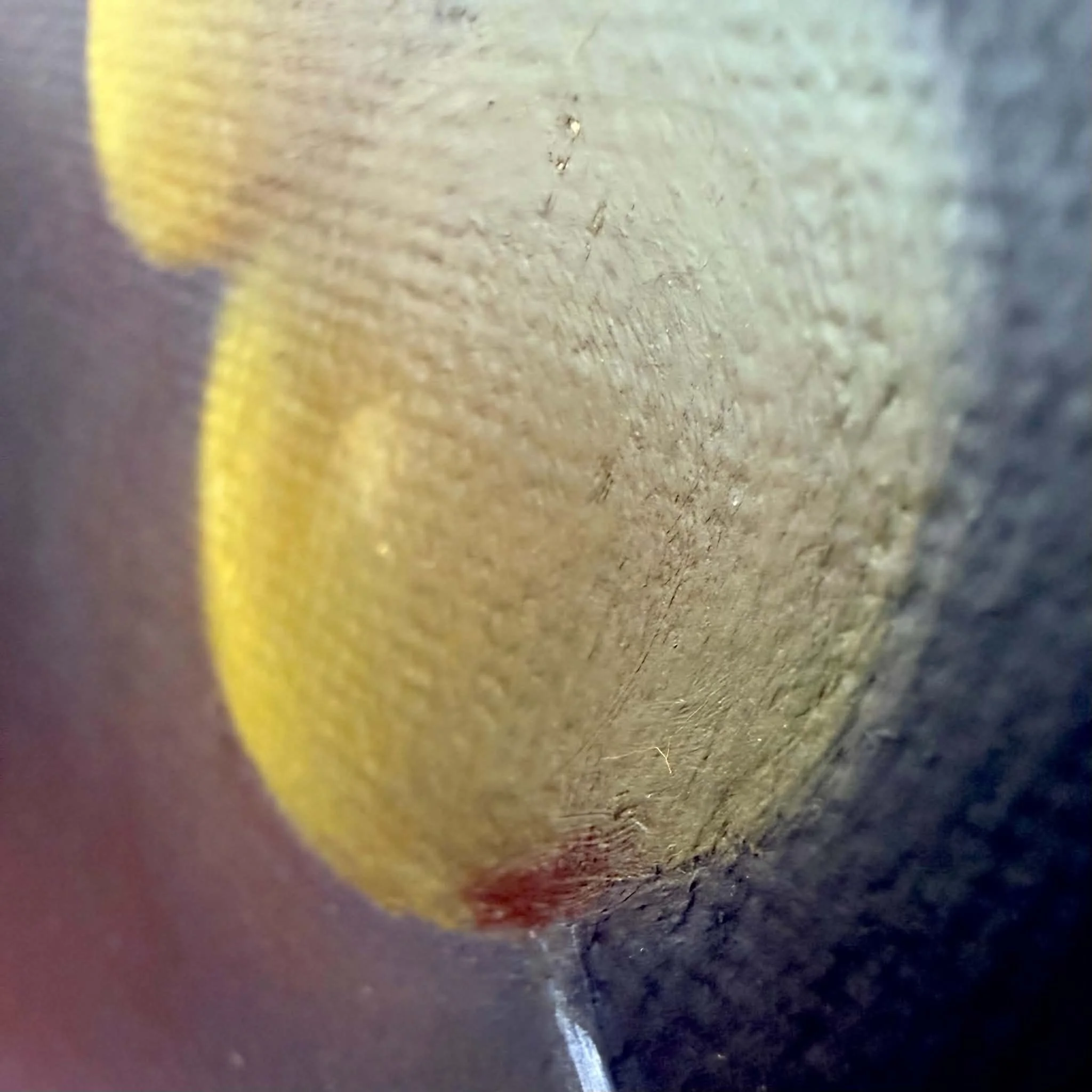 Close-up of cocktail olives painted in oil with soft green highlights, moody shadows, a red pimento detail, and visible canvas texture.