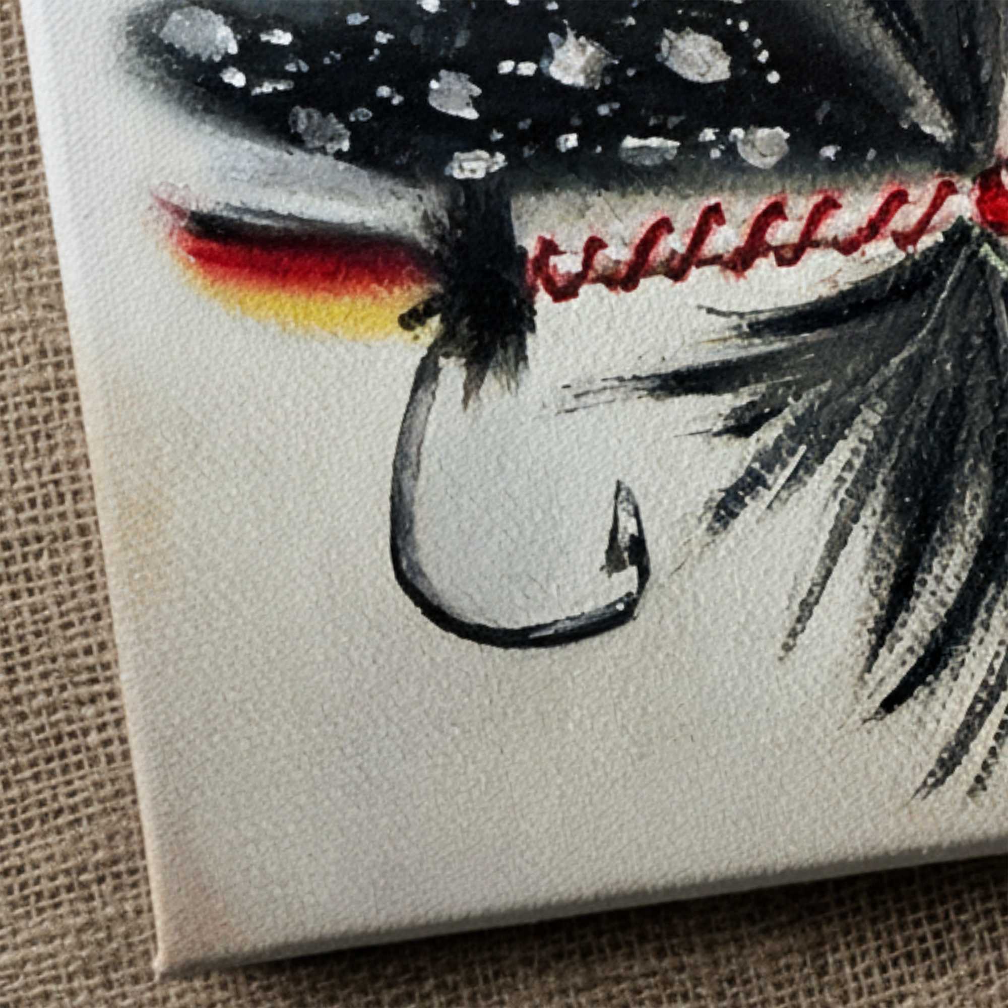 Close-up detail of Fly Fishing Lure 02 Mini Still Life Painting showing oil brushwork, lure feathers, hook, and canvas texture