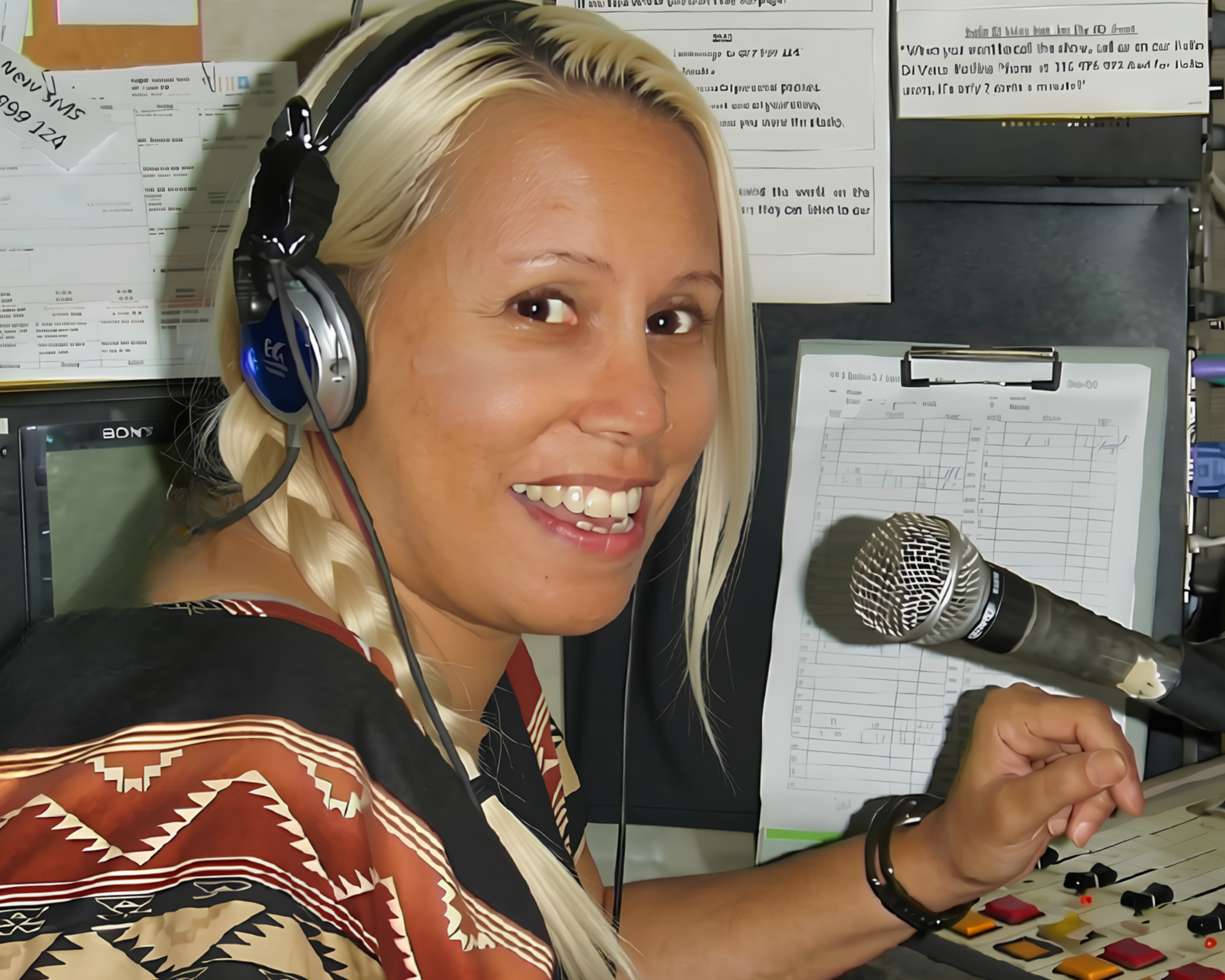 Woman voice actor at microphone