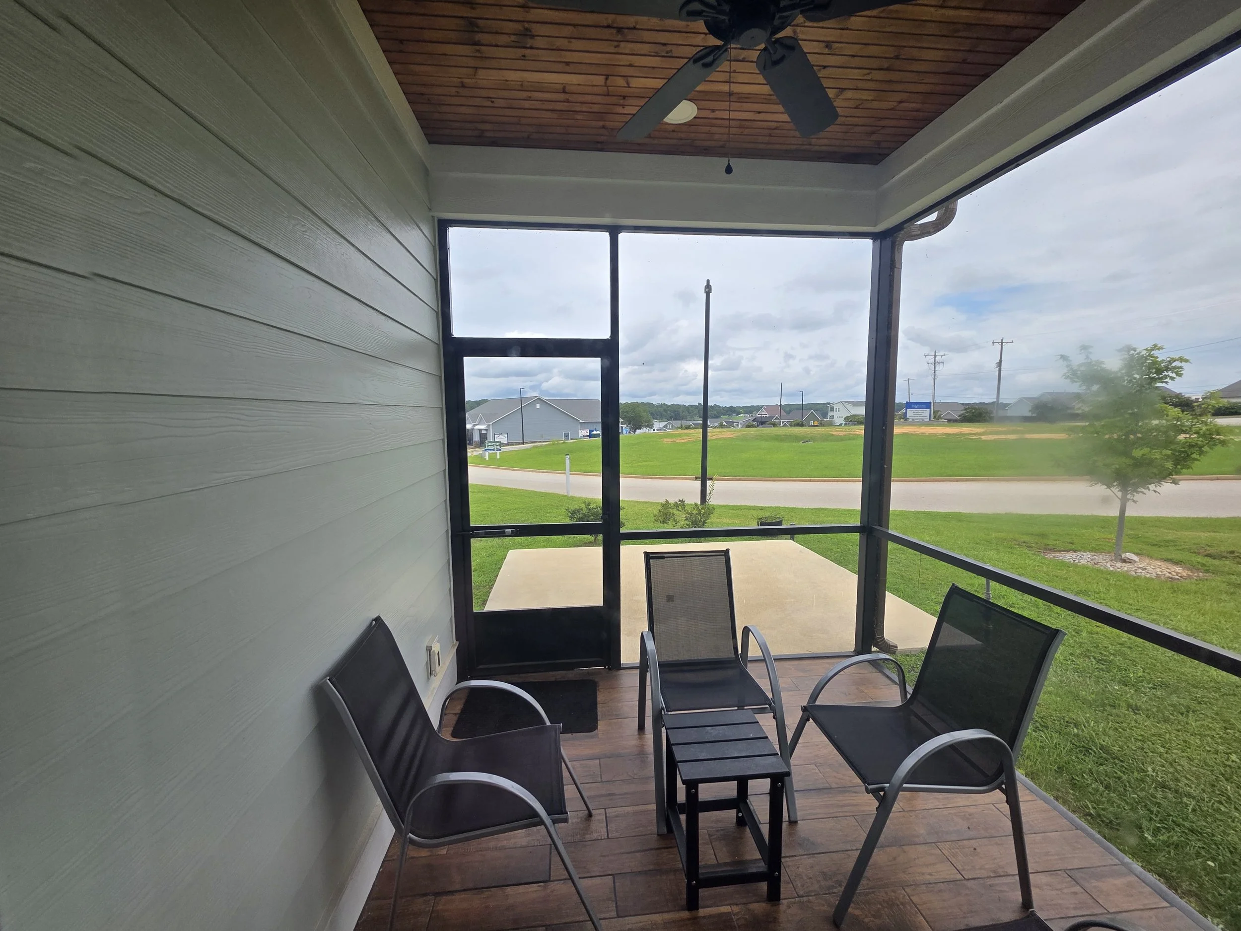 Screened porch at Greenwood SC rental home near Lake Greenwood.