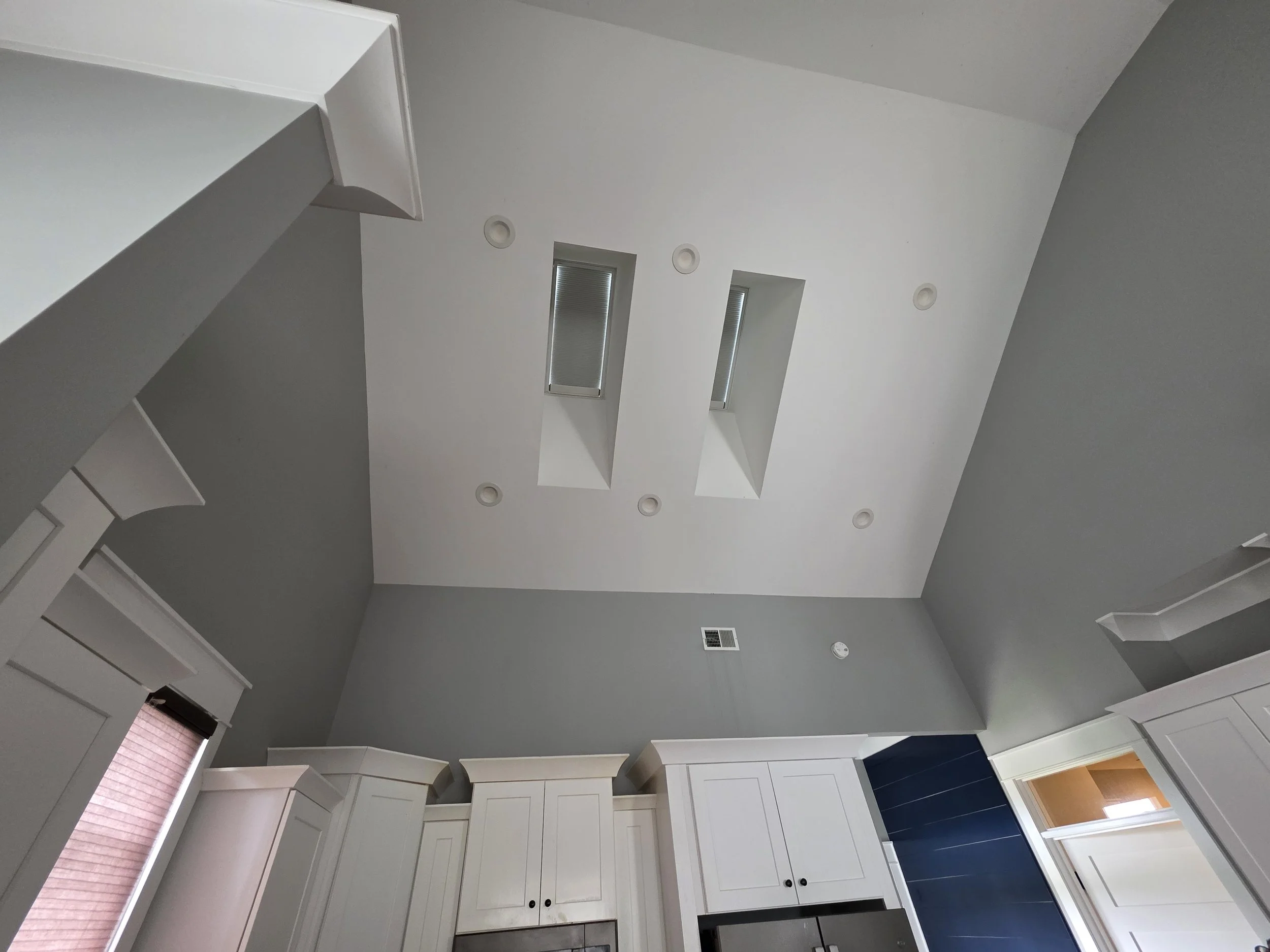 Vaulted ceiling with remote-controlled skylights in Greenwood SC rental home.