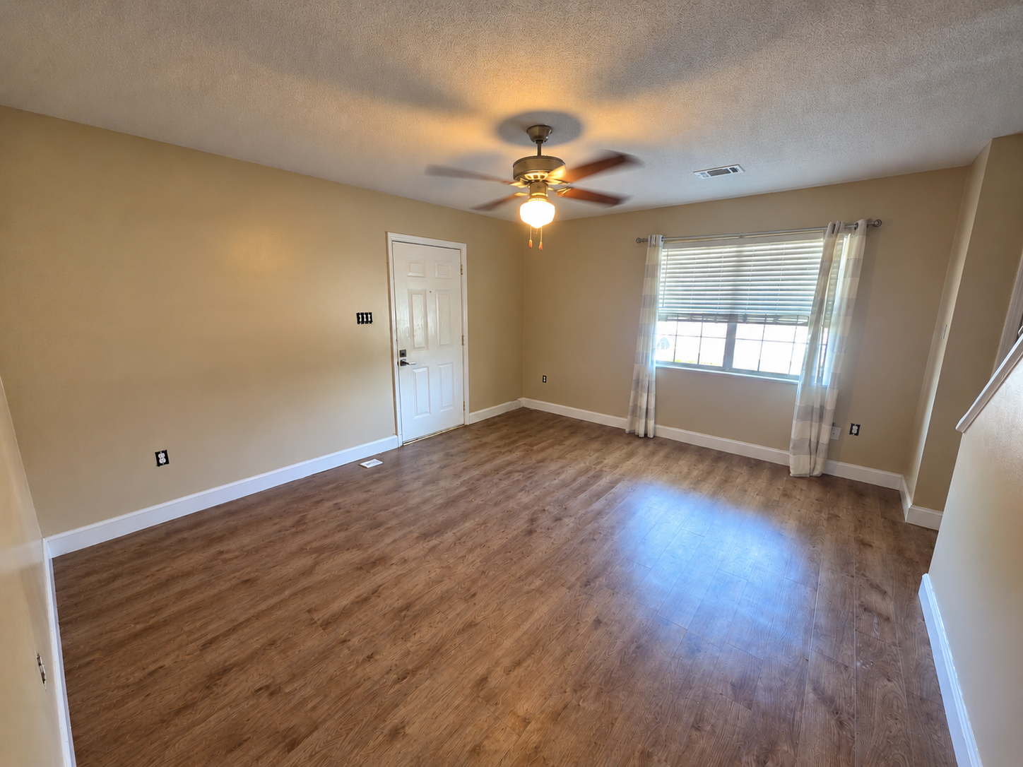 Living room at 107 Country Village Ct, a 2-bedroom townhouse for rent in Greenwood, SC