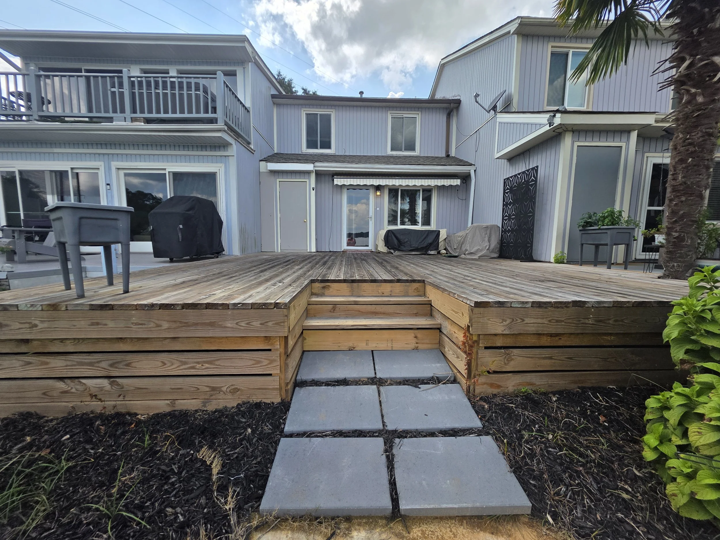 Lakeside deck and rear exterior of 112 Lake Ridge Drive at Pier 96