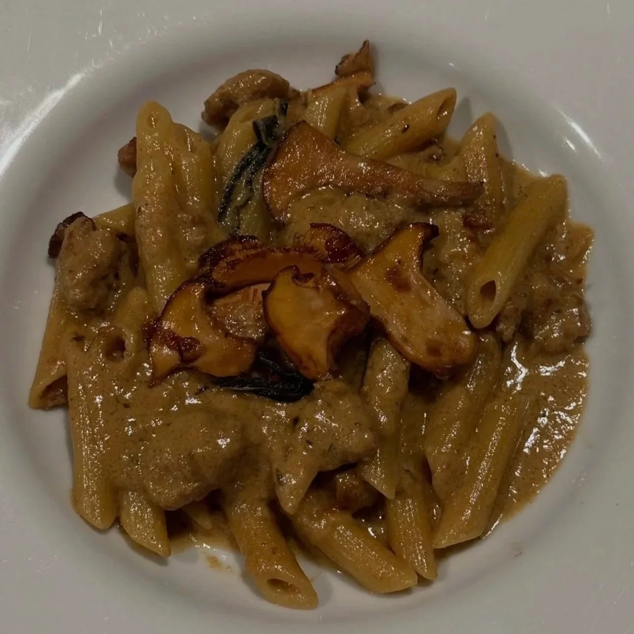 creamy chanterelle mushroom pasta with spicy italian pork sausage and sage