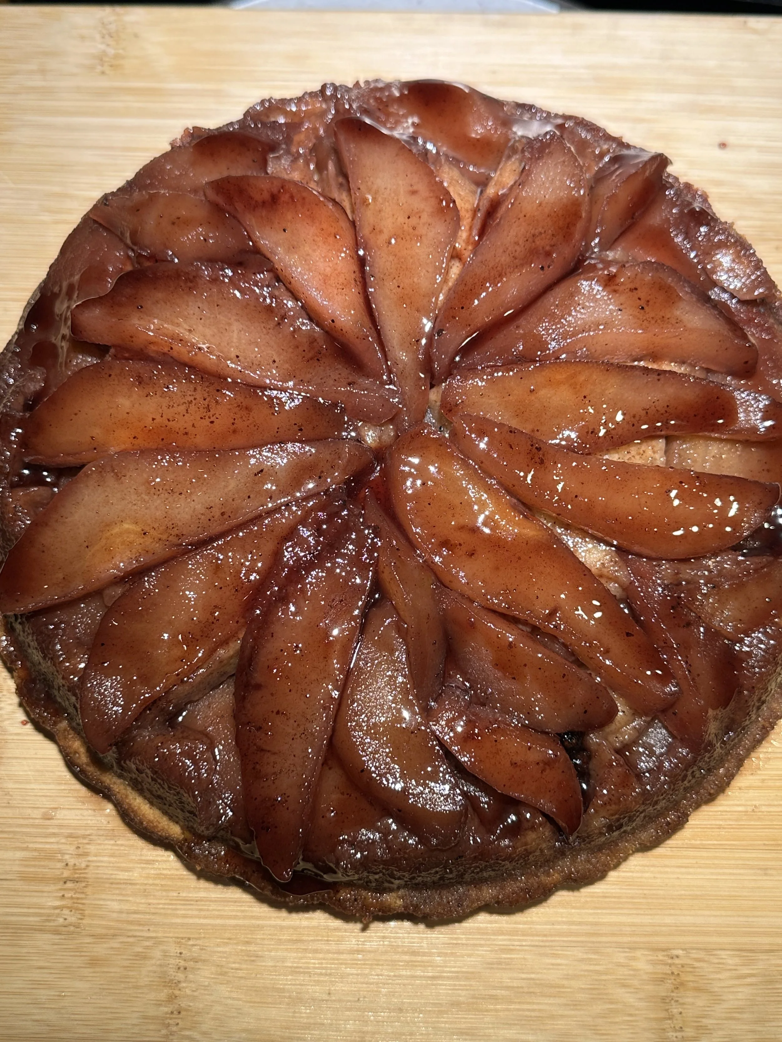 spiced poached pear olive oil cake