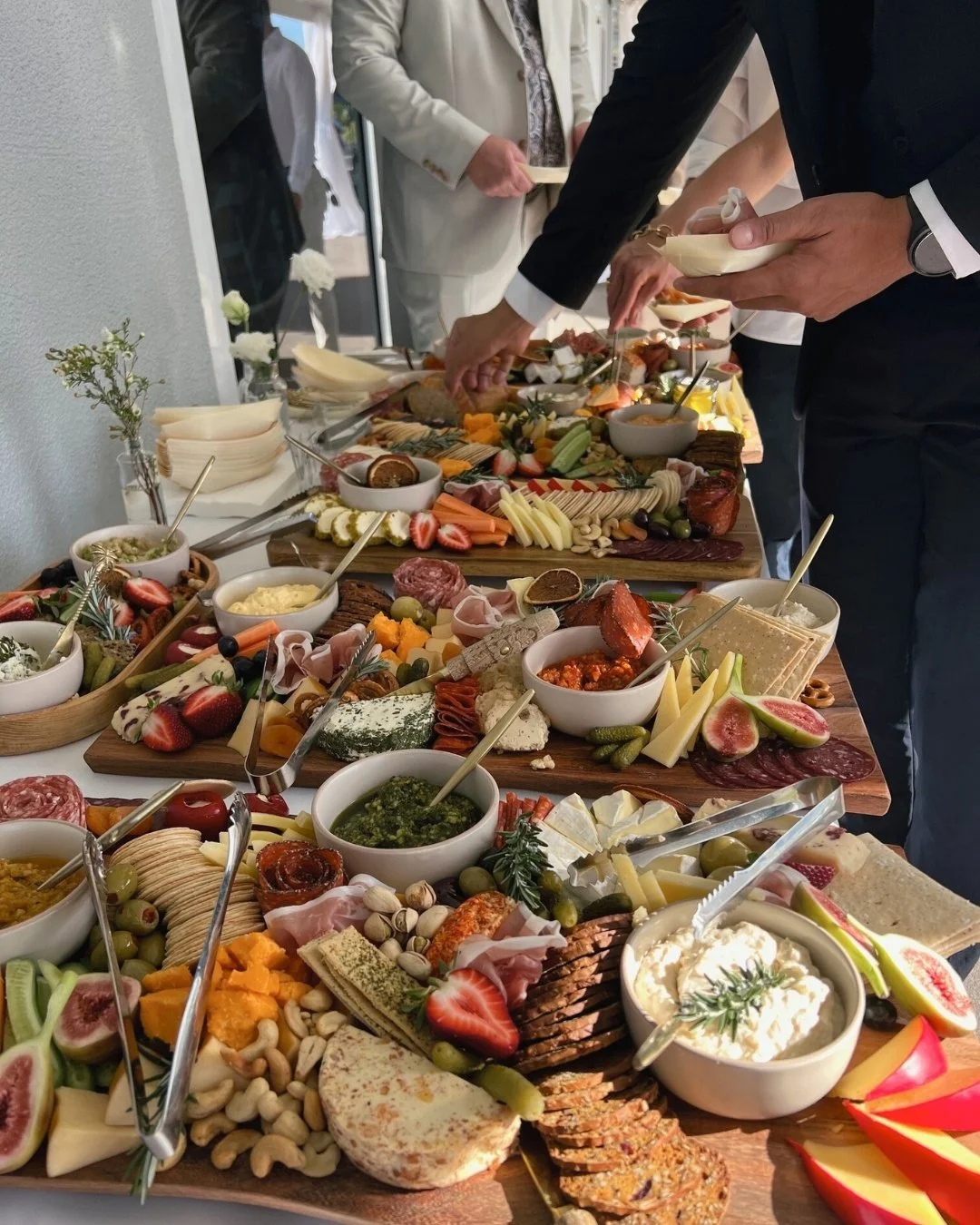 Luxury grazing table catering in Airlie Beach and the Whitsundays by Salt & Silk Collective, featuring styled cheese boards, charcuterie, fresh produce and grazing displays for weddings, corporate events and celebrations