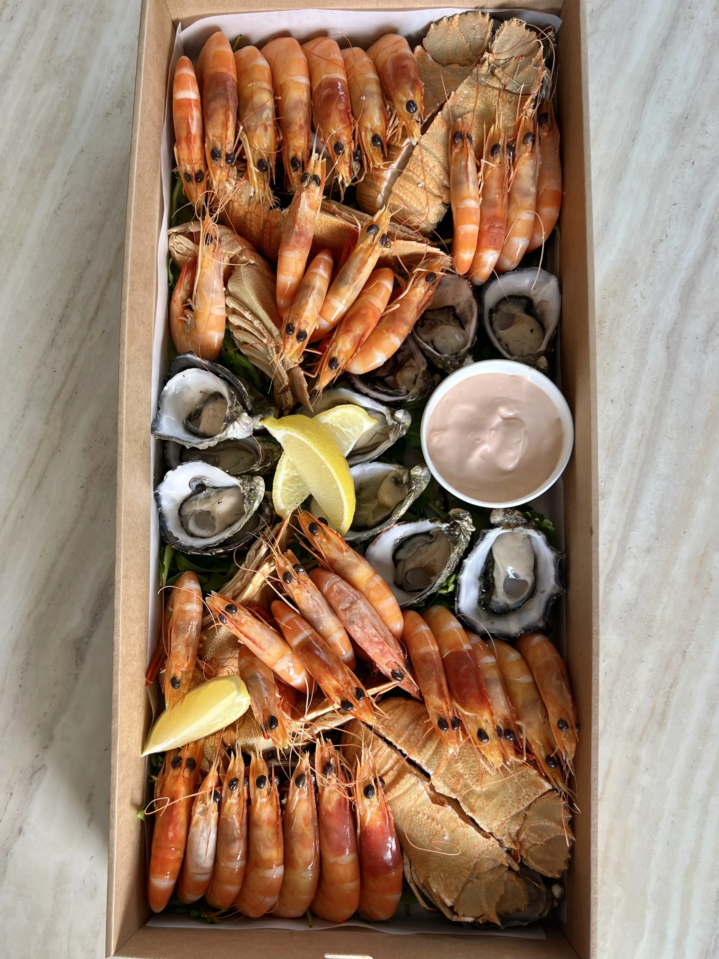 Luxury seafood platter featuring prawns, oysters and fresh local seafood by Salt & Silk Collective, offering seafood platters, grazing boxes and event catering in Airlie Beach and the Whitsundays.