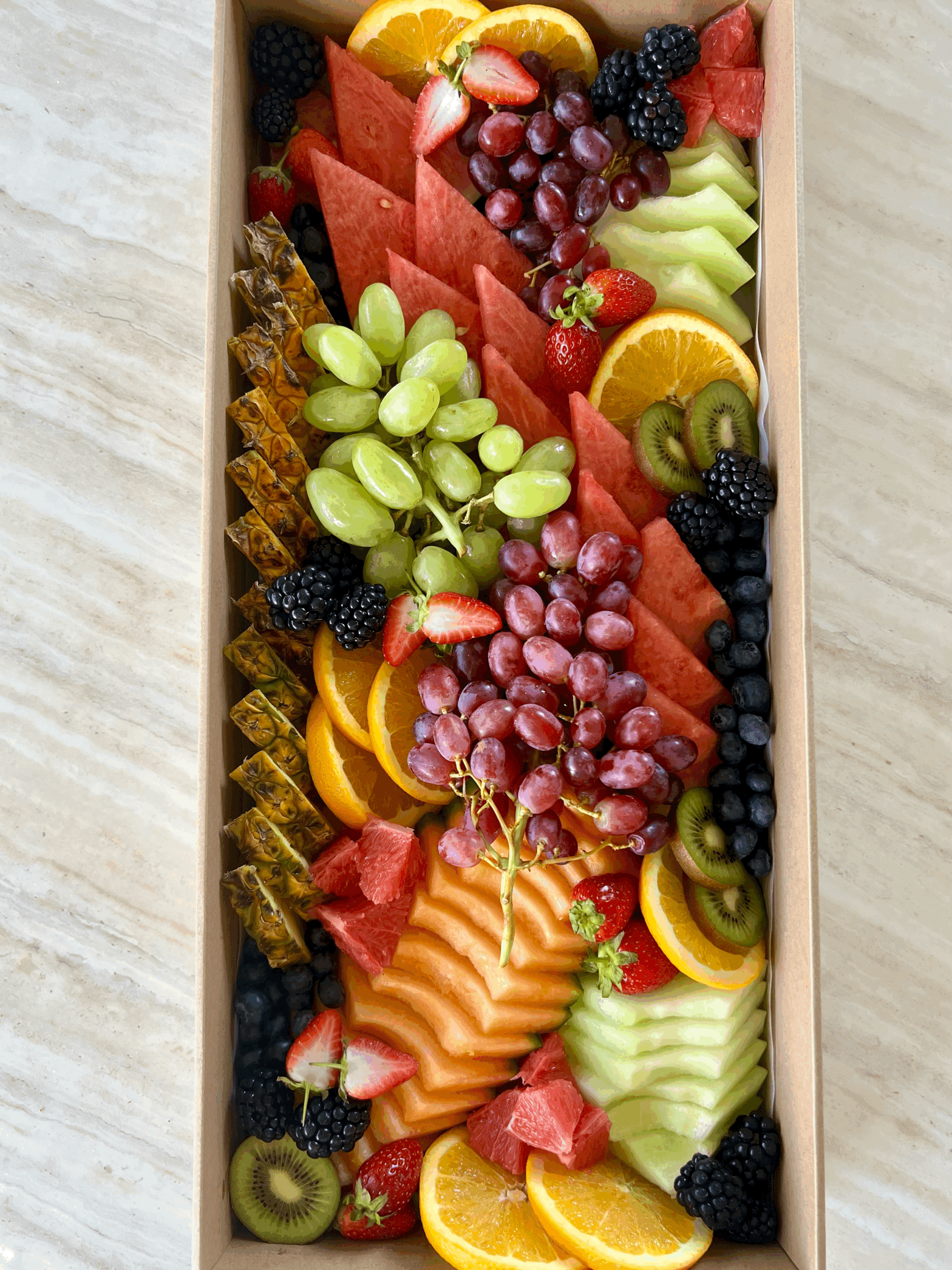 Fresh fruit platter with seasonal tropical fruit by Salt & Silk Collective, offering fruit platters, grazing boxes and event catering in Airlie Beach and the Whitsundays.