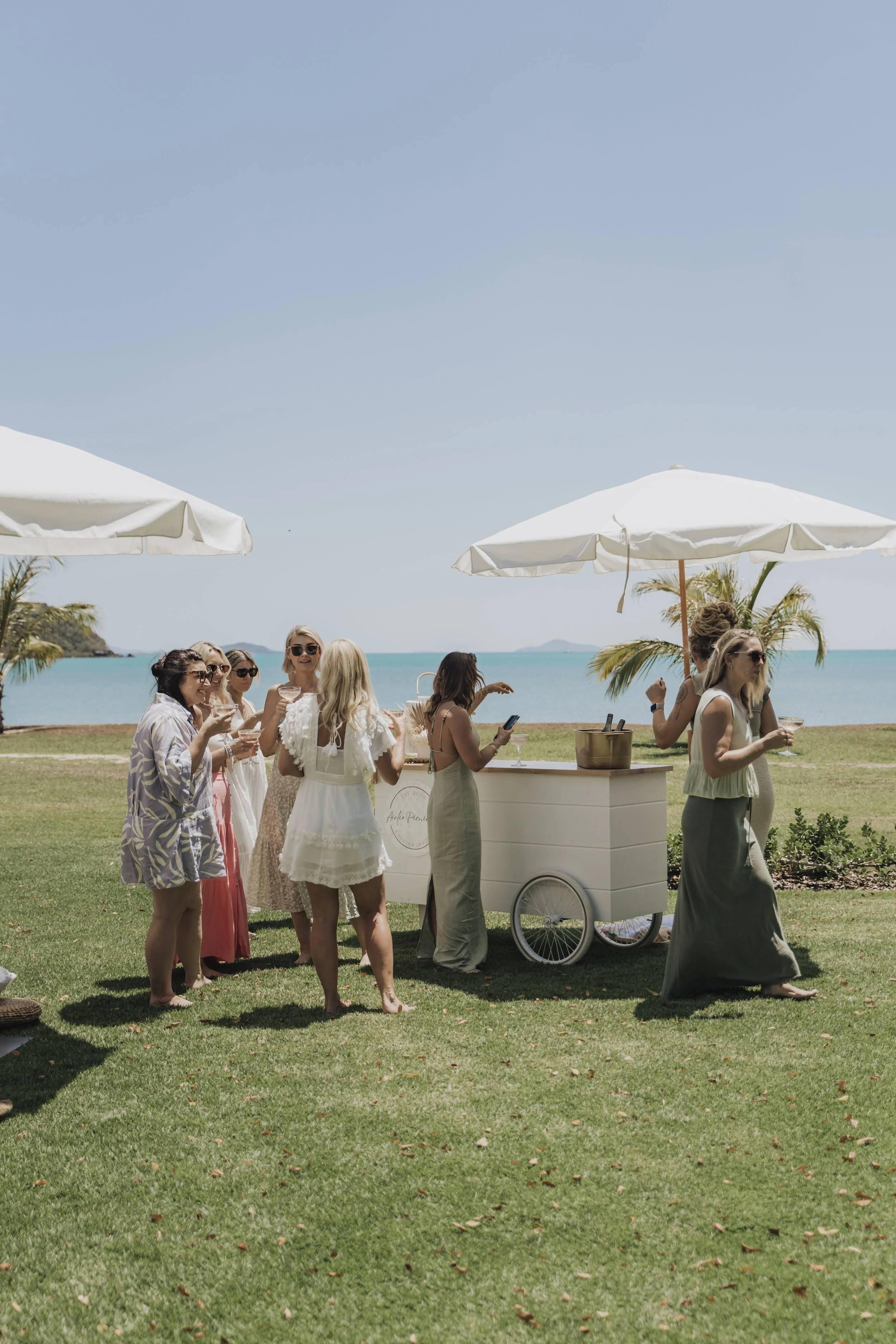 Luxury hens party and bridal shower styling in Airlie Beach and the Whitsundays by Salt & Silk Collective, featuring coastal event hire, bar styling and elevated celebrations overlooking the ocean.