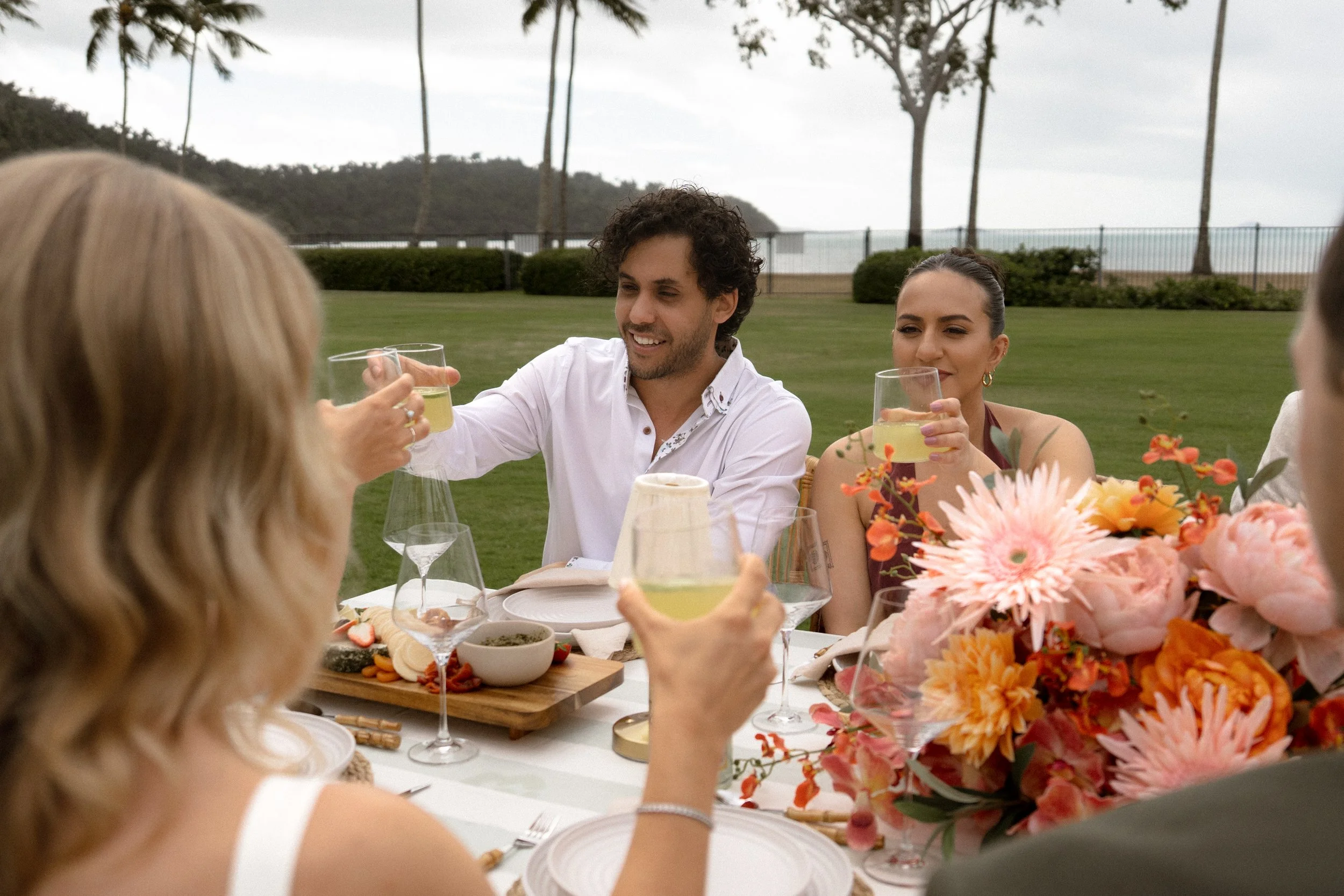 Luxury private dining and picnic experience in Airlie Beach and the Whitsundays by Salt & Silk Collective, featuring coastal tablescapes, grazing and celebration styling.
