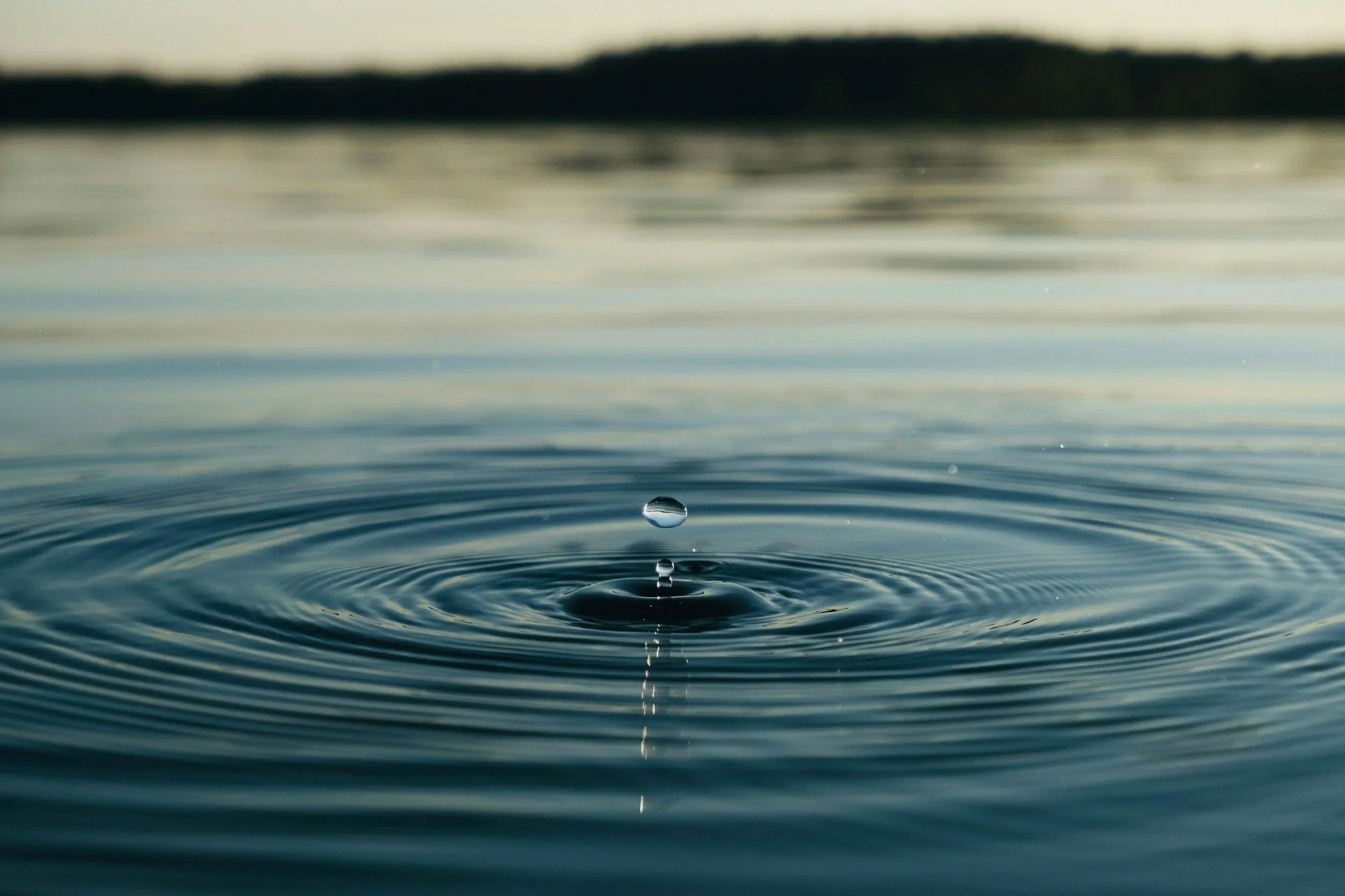 Calm, rippled water surface, symbolizing emotional clarity and tranquility during therapy.