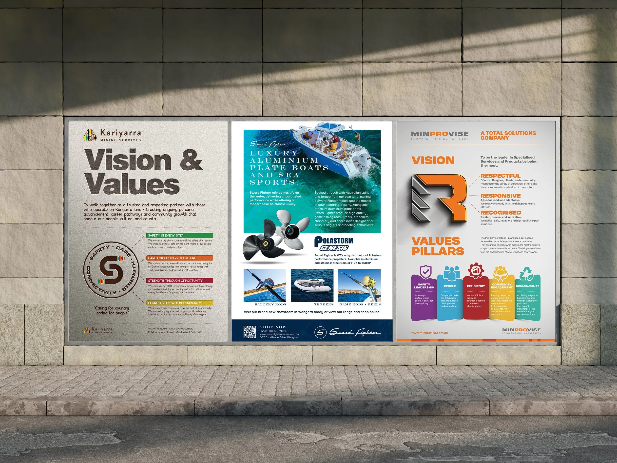 A detailed outdoor advertisement board with various sections promoting mining services, luxury boats, company values, and other products and services. It includes text, logos, and images of boats and equipment mounted on a stone wall.